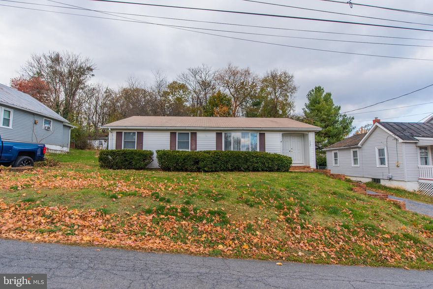 So much house!  This 3BR/2BA home has over 1500SF of living space on the main floor!  You will notice new carpeting throughout, generously sized rooms (17x11 master bedroom and 16x13 living room), and a cozy wood-burning stove in the family room.  Downstairs, the full-sized, partially-finished basement allows for ample storage and/or possible additional living space.  Ready for your finishing touches, there is plenty of potential in this lovely house!