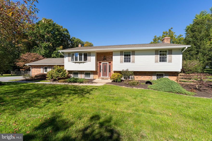 OPEN HOUSE CANCELED!  FINAL OFFERS DUE SUNDAY, OCTOBER 13TH AT 11 AM.  
This updated split level has so much to offer with over 2000 sq ft of living space.   The common space on the main level consists of the living room, dining room and eat in kitchen.  The huge covered deck is right off of the dining room and has a connecting stairway to the beautiful patio level.  Its perfect for entertaining!  The primary bedroom is on the main level and has its own private bath.  The 2 remaining bedrooms on the main level share a hall bathroom.  The lower level features the 4th bedroom and a half bath.  The family room is very spacious with a gas fireplace to keep it toasty in the winter.  This room also leads out to the patio and to the very large, fenced back yard.  The 2 car garage can be accessed directly into the house so no need to walk outside in inclement weather! Tons of storage, a beautiful entrance and so much more.  Schedule a private tour or check out the open house!