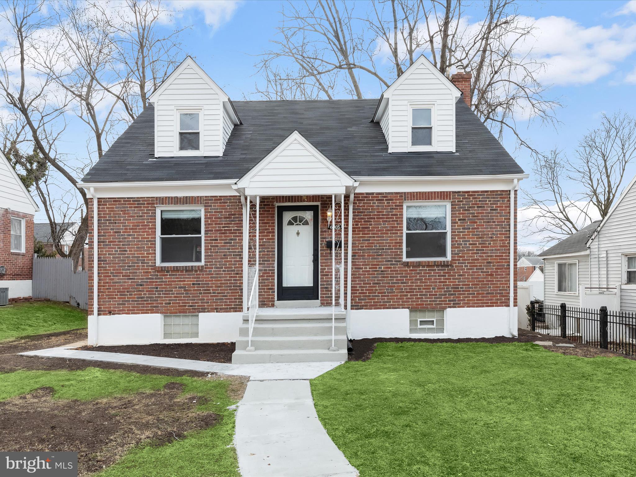Introducing this completely turn key updated brick Cape Cod offering four spacious bedrooms with two-full and one-half bathrooms spread across three levels. Renovated throughout, this home features fresh neutral paint and refinished hardwood floors on both the main and upper levels. The dining room flows into the kitchen, which boasts new cabinets, quartz countertops, a tile backsplash, ceramic flooring, and stainless steel appliances. Kick back and relax in the front living room, featuring recessed lighting. The main level also includes a bedroom and a newly designed full bathroom with a tub shower. Upstairs, the primary bedroom comes with an attached half bathroom, and the second bedroom is just across the hall. The fully finished lower level adds even more living space, complete with luxury vinyl plank flooring and recessed lighting in the spacious recreation room, fourth bedroom, and a second full bathroom with a walk-in shower. The lower level also includes a laundry room with storage space and walk-out stairs. Enjoy spending time in the spacious backyard, which includes a patio and plenty of room for outdoor activities and relaxation. Additional updates include a new washer and dryer, water heater, HVAC system, roof, front walkway, interior doors, several newly replaced windows, and more. This home is completely move in ready and nothing for you to replace for years to come! Some images have been virtually staged.