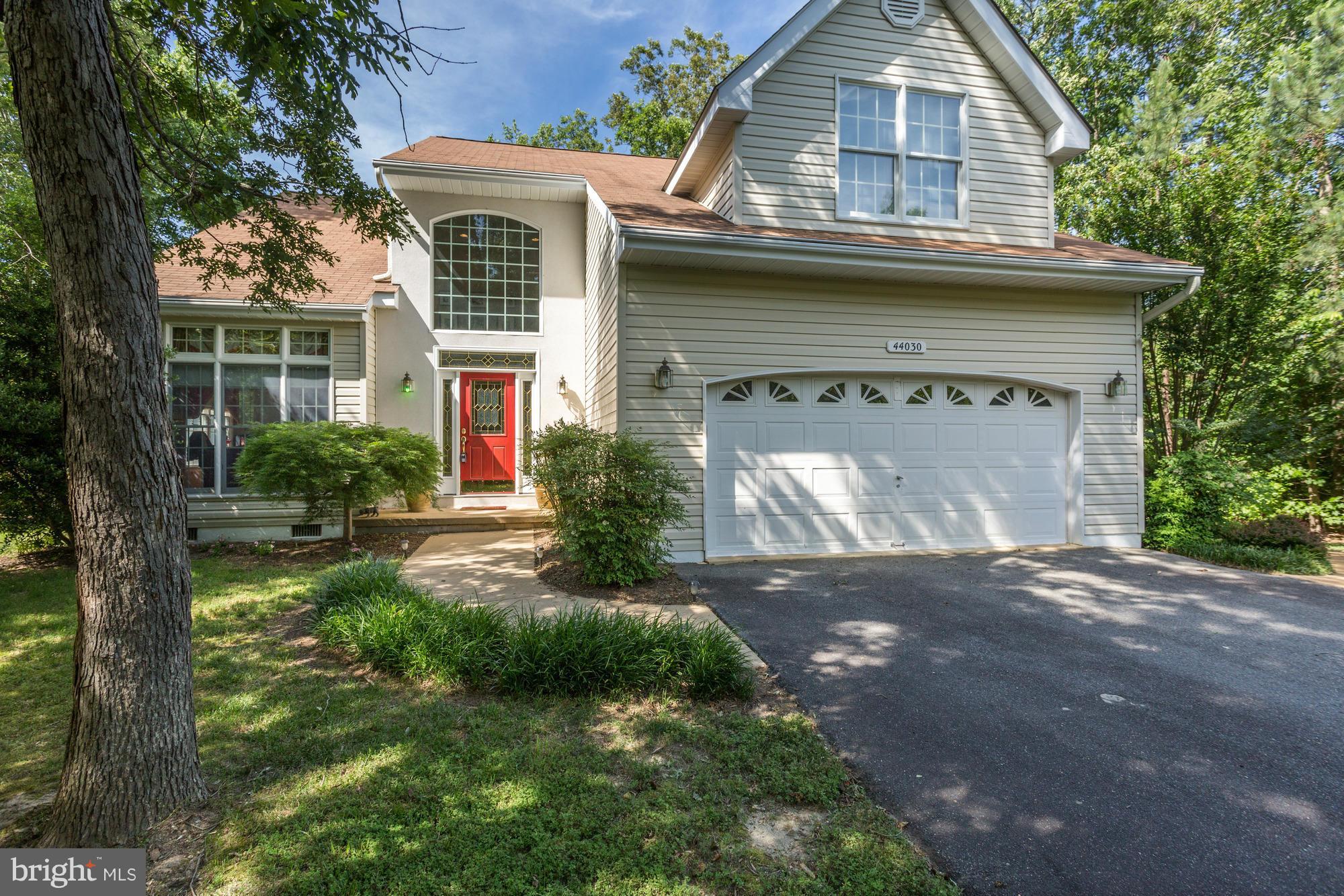 MOTIVATED SELLER!! -This beautifully maintained former model offers lots of bell & whistles . From the cathedral ceilings, hardwood & tile floors, FP w/ custom trim/shelves, granite counters, SS appliances, center island, separate LR & DR , impressive master suite w/ bath, 2 walk in closets (one cedar) , 3 additional bedrooms, - to the patio, large deck w/pergola and 2 car garage.MUST SEE!