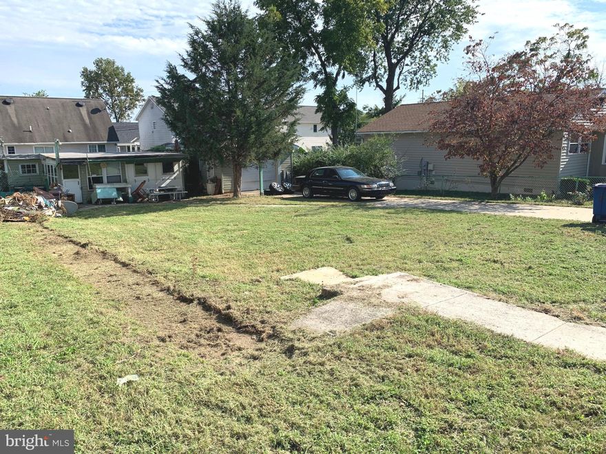 Value is in the Land (6,059 square feet).  Property holds a shed like structure and a one car garage.  Great location, near shopping, restaurants and so much more! Sold As-Is!