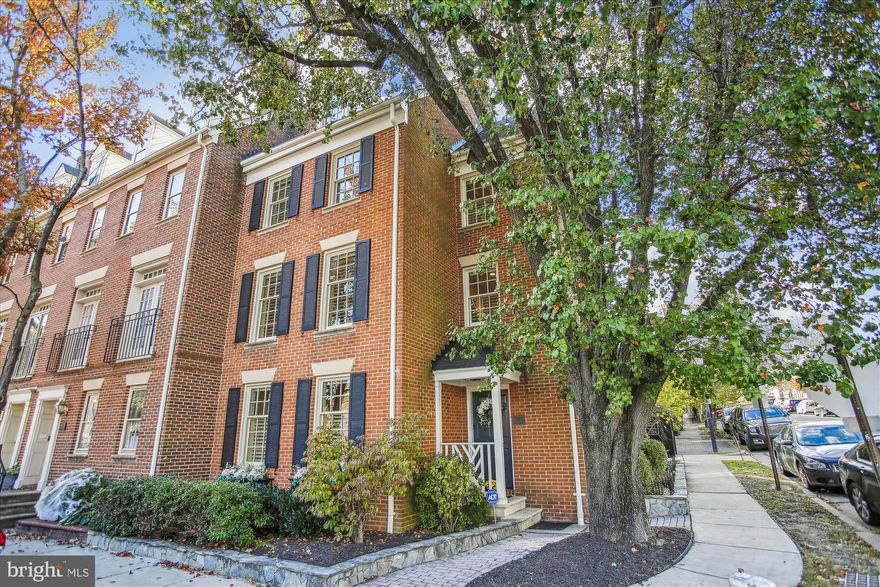 Fabulous Townhouse in sensational Old Town location. Welcome to 401 S Union St on the corner of Wolfe and Union in the Southeast Quadrant of Old Town Alexandria. This beautiful brick townhouse features 4 bedrooms with 3.5 baths on 4 spacious levels with hardwood floors throughout and views of the Potomac River from many rooms. The excellent floor plan presents a welcoming foyer, dining room with woodburning fireplace, living room with built-ins, and an updated gourmet kitchen with stainless steel appliances, quartz counter tops, and large hidden pantry. The home is built for entertainment with 2 sliding glass doors that open to the huge brick patio and your own personal off-street parking space. There is also a powder room on the main level. The Owners Suite on the second level features a huge bedroom with another woodburning fireplace with custom built-ins and a custom walk-in closet with a fabulous primary bath. The third level presents 2 spacious bedrooms with an updated bath. This level is currently fitted out as a gym and an office. The top level presents a huge front-to-back bedroom with tall ceilings and views of the Potomac River to the east and Old Town rooftops to the west. There is another full bath and laundry on this level. Custom plantation cafe-style shutters throughout the home. The location next to the new Old Town waterfront with all the parks and restaurants make this townhouse just about Perfect! Built in 1978 with over 2,500 SF.