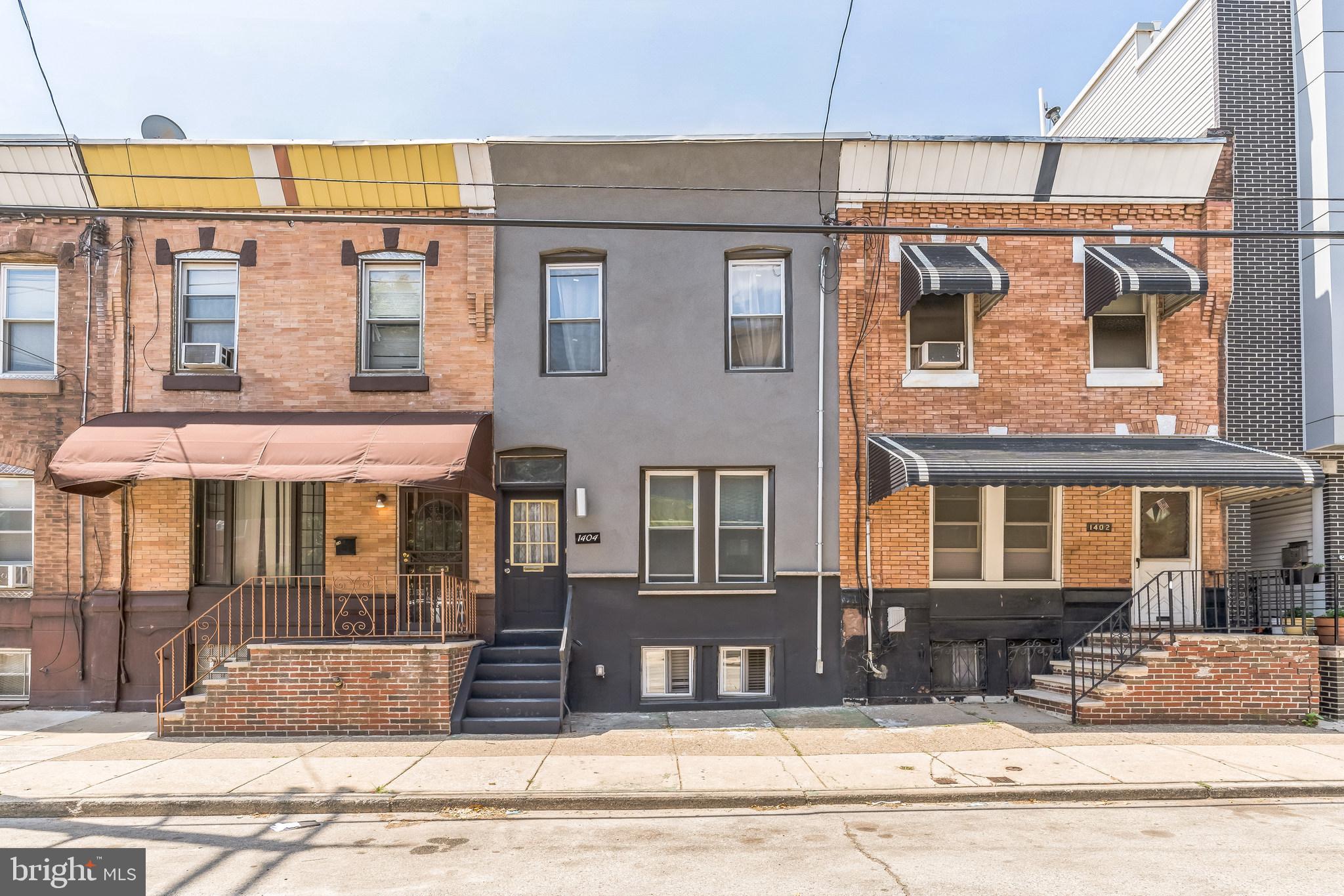 Welcome to 1404 S 24th Street, a 4-bedroom, 1.5-bath brick townhome located in the heart of Point Breeze. Offering approximately 1,310 sq ft of interior space, this 2-story home blends classic 1920s charm with great potential for modern updates. The main floor features a spacious living and dining area, original hardwood accents, and a convenient half bath. The kitchen is ready for a custom refresh and opens to a small backyard perfect for grilling or gardening.
Upstairs, you’ll find four well-sized bedrooms and a full hall bathroom. The full basement offers ample storage and utility space, with the possibility of future finishing. Whether you're a first-time buyer, investor, or looking for a home to renovate and make your own, this property offers flexibility and opportunity.
Located just steps from Wharton Square Park, close to public transportation, shops, restaurants, and major highways. With its RSA-5 zoning and a strong rental market in the area, 1404 S 24th St is ideal for an owner-occupant or investor seeking value in one of South Philly’s fastest-growing neighborhoods.