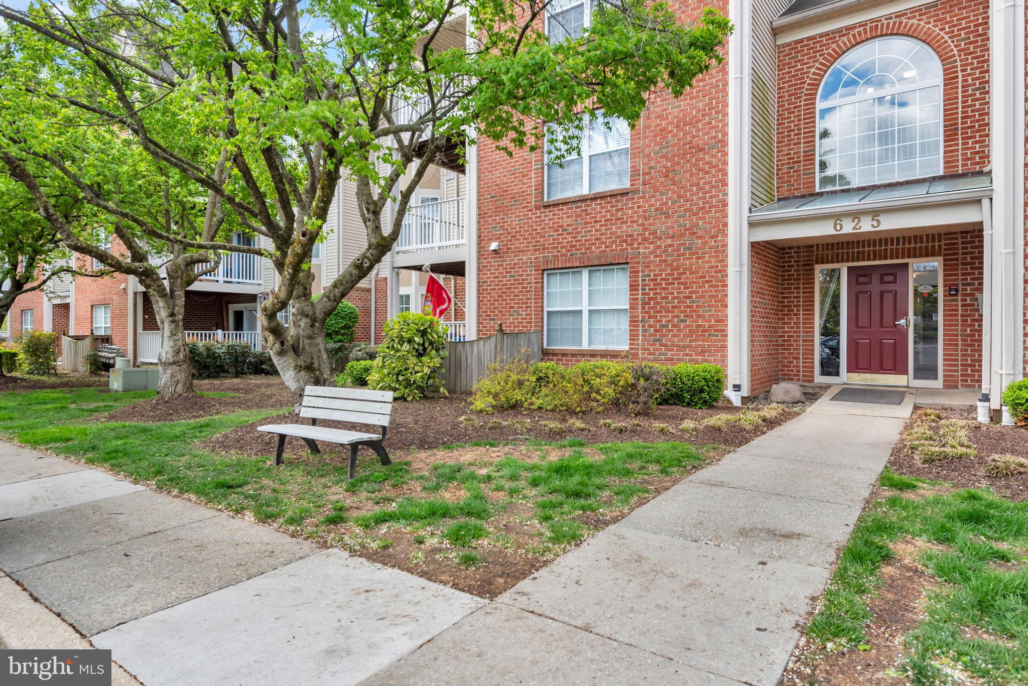 This beautifully updated condo features a welcoming open floor plan, private balcony and quiet tree-lined view! Enjoy the brand new carpet and luxury vinyl flooring as well as fresh paint throughout. Step into the living room with a cozy gas fireplace, open to a spacious dining area and bright kitchen with breakfast bar. Just off the kitchen, your peaceful balcony provides a covered outdoor area with a serene view of the woods. A spacious primary suite incudes an updated bathroom; you'll love the enormous walk-in closet! The second bedroom could also serve as a perfect home office and/or guest bedroom. The sparkling hall bath includes a tub/shower. The in-unit laundry room also has additional shelving and storage space. The fabulous community amenities at Harbour Gates include an outdoor pool, fitness center, clubhouse, tennis and basketball courts, as well as space to grill out come summer! Convenient surface parking is right outside the secure building entrance. Harbour Gates is just around the corner from Anne Arundel Medical Center and the Annapolis Mall; live less than 15 minutes from Downtown Annapolis, convenient to Fort Meade/NSA and BWI Airport, and just off major commuting routes I-97 and Rt 50. Welcome Home! ***No Pets Please! Please note: Condo rules prohibit smoking in or near buildings.***