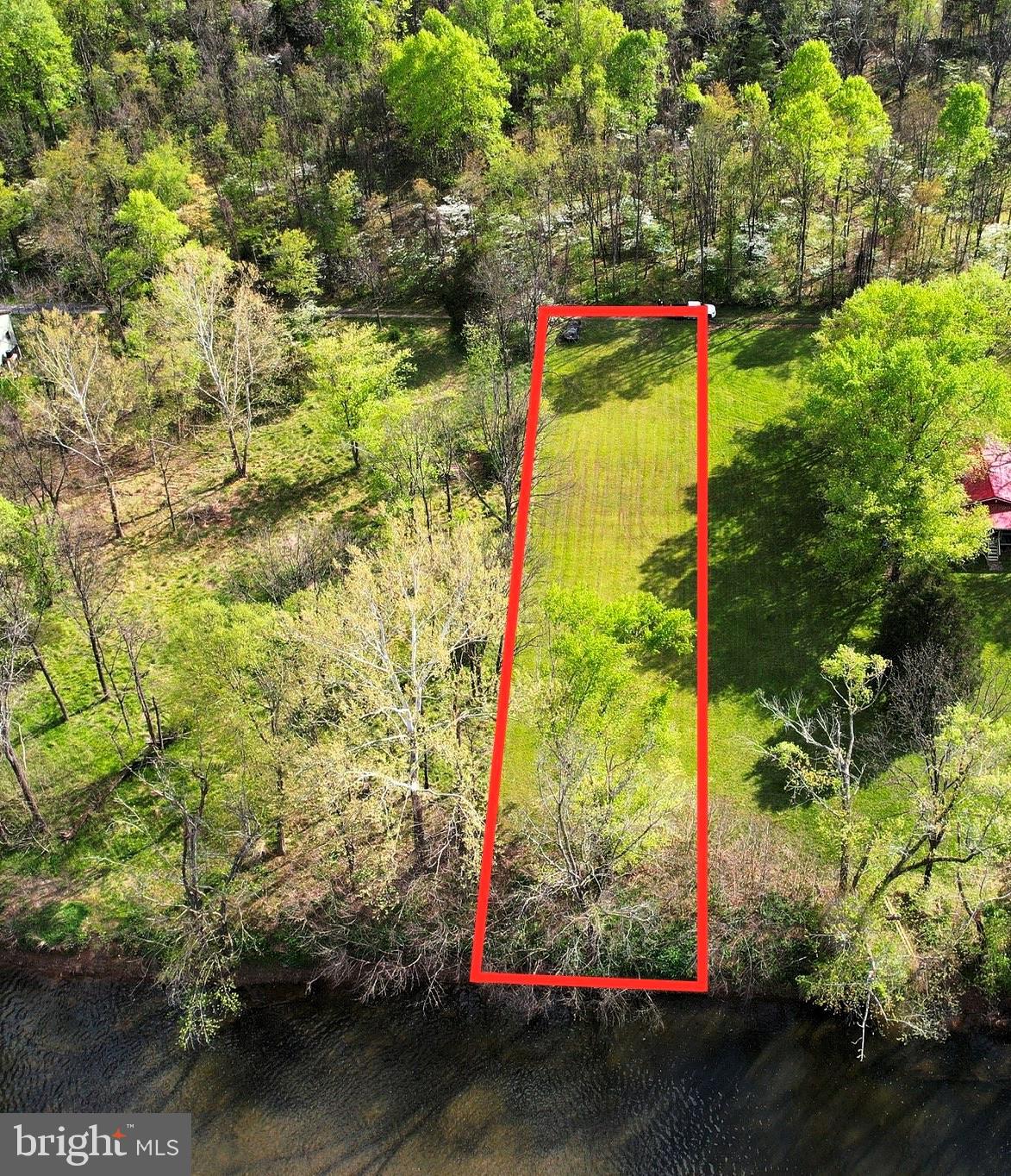 Come see this stunning lot nestled along the Cacapon River. River access makes it great for kayaking, floating, or simply just relaxing. This lot will be great for pitching a tent or building your weekend getaway! Do not wait, because this riverfront property won't last long!