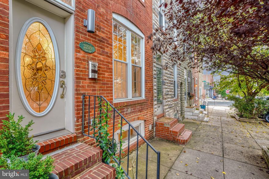 Wonderfully Maintained 3 Bedroom, 2 Full Bath Townhome In Great Location. Possible Rear Parking With A Minor Alteration. Open Main Level With A  Beautiful Brick Wall, Crown Molding, Spacious Kitchen With Breakfast Bar, Desk, Stainless Steel Appliances. Upper Level Has Primary Bedroom With Gas Fireplace, 10 ft. Ceilings, Bath With Jacuzzi Tub. Two Skylights. There is a Hall Full Bath And Second Bedroom With Access To Newly Constructed Rooftop Deck (2019) With Incredible Views Including Water. Lower Level Has Third Bedroom/Den And Utility Room With Washer/Dryer. Other Updates Include Rear Windows And Siding, Basement Flooring, W/D, Water Heater, Silicone Roof Treatment. A Great Home At A Reasonable Price!