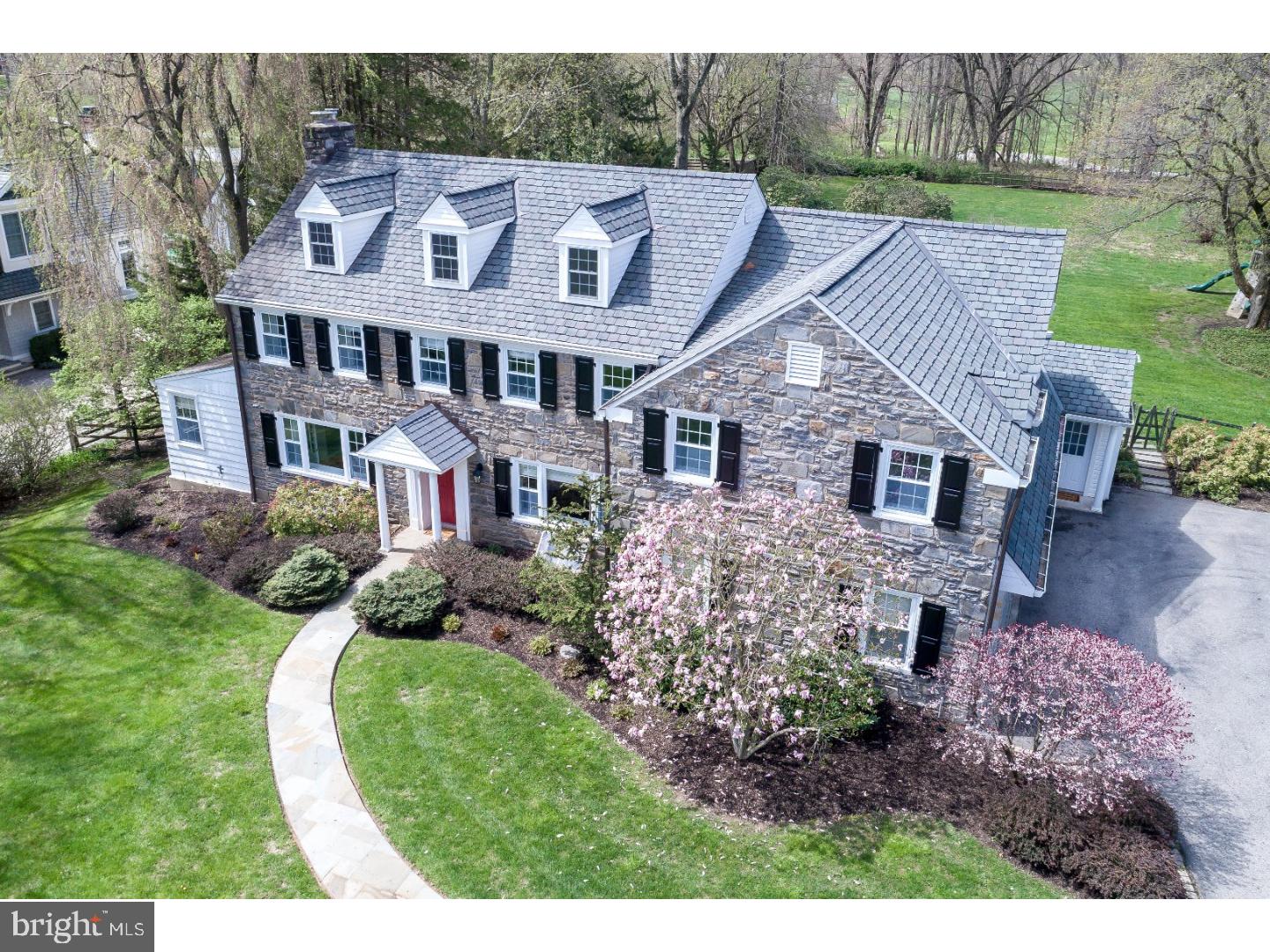 Come see this beautiful stone, colonial that was expanded by two additions over the years to create a special property within Radnor Township. Situated on a level acre that backs up to the former Ardrossan Estate, this home has amazing views and dramatic sunsets during winter months. The classic traditional layout has been expanded to include a fabulous kitchen with a Viking range, a built-in wine cooler, granite countertops, oak hardwood flooring and custom cabinetry. There is a breakfast nook and an adjoining family room. The former exterior stone wall is a highlight along with the gas fireplace and the custom woodwork. The covered flagstone patio is accessible through French doors from the large kitchen and is a short walk to the fenced in-ground pool. There is a formal living room with another gas fireplace, a secluded office for days when you are working from home and a bright formal dining room for holiday dinners. Upstairs you will find a fabulous master bedroom/bathroom. There are three additional bedrooms, two full baths and a built-in homework nook. The finished basement has been transformed by the current owners, with a new full bathroom, flooring and recessed lighting. A fabulous location with easy access to shopping, schools and major highways.
