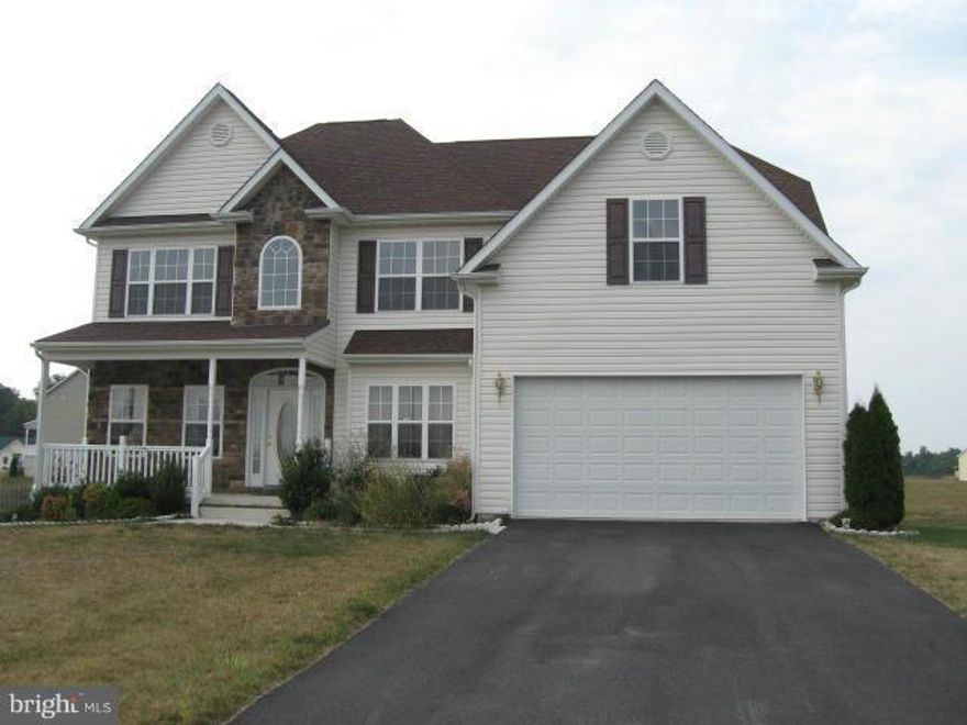 Upgraded Colonial on corner lot in sought after Apple Knolls SD.  Guest room with bath on first floor. 2 story family room with fireplace and great windows. Separate dining and living rooms and big basement for storage. Corian counters and hardwood floors . Breakfast/sunroom to enjoy.  This is a home made for comfortable country living! Convenient to I81 and stores.