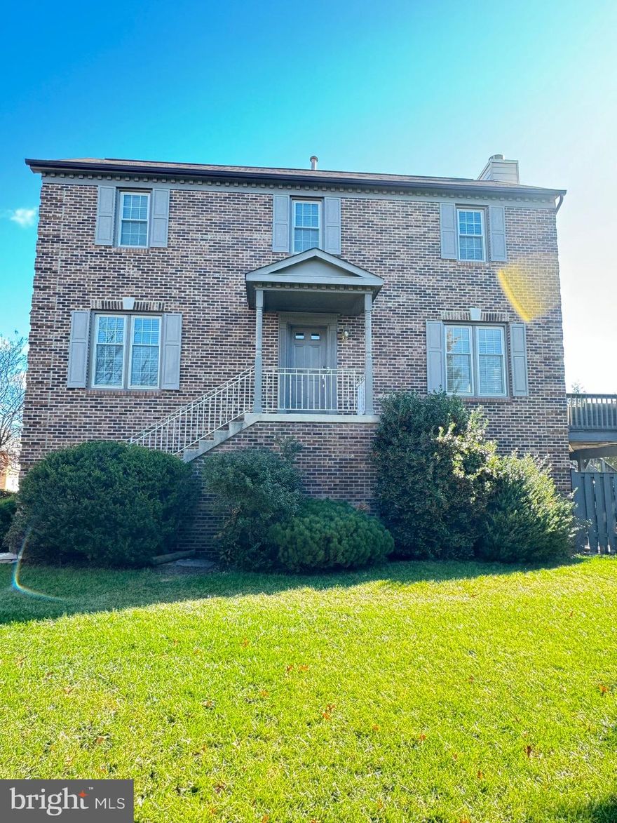 BEAUTIFUL END UNIT TOWNHOME w/ CORNER LOT - Colonial Style - Renovated 2019 - Professionally Managed - Movie Room w/ Projector - Inviting deck and backyard space perfect for relaxing and entertaining - Luxury Finishes - Granite Counter Tops - Energy Efficient Home: Enjoy a cozy environment year-round with brand new windows and custom blinds that enhance energy efficiency. Newly installed insulation in the attic provides excellent temperature stability, helping you save on energy costs. Spacious Kitchen: Benefit from the unique bump-out storage in the kitchen bay window area, offering additional space for your culinary needs and storage (Dishwasher on ground is as-is, counter unit works). Convenient Laundry Room: The addition of a laundry sink in the laundry room adds practicality to your daily chores, making laundry easier than ever.