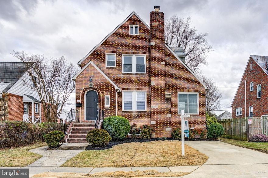 BEST & FINAL OFFERS DUE  TUESDAY 2/6 BY 6PM - With a Blend of the old-world charm and modern updates, this Rarely available all brick Tudor Style home with slate roof in Lavender Hill was renovated with careful consideration to maintain the tradition of the home while updating to modern conveniences. Nothing was overlooked to ensure an amazing living experience. As you enter the arched top front door into the main living room, you will be taken back by the gorgeous newly finished original hardwood floors and captivated by the 9-foot ceiling heights. Enjoy the cozy corner fireplace with LED sconces, opening to a nice sized sunroom. The dining room opens up to the extra large kitchen with 8 foot quartz top island, all new stainless steel appliances, soft close 42 inch cabinets, trendy backsplash and a walk-in pantry. From the kitchen you can step out to your back porch over looking the level back yard and 1 car garage with slate roof. When you make your way to the second level of the home you will find 3 over-sized bedrooms maintaining the original charm with the original finished hardwood floors and all original functioning Barrel Key  door knobs and keys, all blended with LED lighting to give you a bit of a modern feel. The fully refinished full bathroom with tile surround and over sized vanity make this a great place to start your morning routine. Make sure you do not miss the fully finished walk up attic which was insulated to ensure it stays comfortable year round, this space stretches the length of two bedrooms and makes a great play room or additional bedroom. When you make your way to the basement you will love the industrial look of this fully finished basement with recessed lighting exposed brick, some amazing nooks perfect for a wine cellar, and an additional full bathroom and laundry. In addition to being blown away by the features and charm of this beautiful home, you will be comforted by knowing the home has all new windows, a new HVAC system, new hot water heater, all new plumbing, including a new water line to the street, a new 200amp electric panel and new main service line, and the entire perimeter of the basement has been waterproofed. Now make this amazing residence your home by scheduling a tour today.