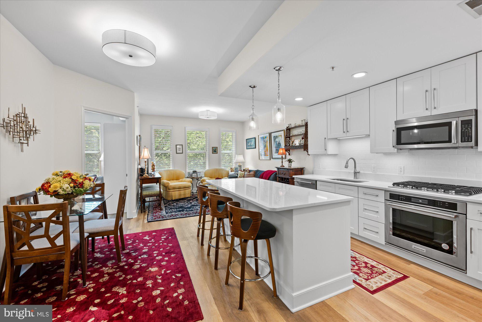 ***PRICE IMPROVEMENT***Discover an exceptional opportunity to own a stunning residence at 12500 Park Potomac Avenue, Unit 205S, Potomac, MD, nestled within the prestigious Park Potomac Place. This elegant home spans @1000 square feet and features one beautifully appointed bedroom plus a den that can double as a second bedroom; and two luxurious bathrooms, ensuring both comfort and sophistication. OVER $50,000 IN IMPROVEMENTS! Nothing like it at Park Potomac!<br><br>
Step into the newly RENOVATED KITCHEN, a culinary enthusiast's dream, boasting pristine white cabinets, exquisite white quartz countertops, and a stylish white subway tiled backsplash. The kitchen is further enhanced by a new gas cooktop and new oven, along with chic luxury light brown wide LVP flooring that extends throughout the entire unit. The dining area is adjacent to the kitchen and the living space which is bathed in natural light from three large windows, offering serene and verdant views.<br><br>
The primary bedroom is a sanctuary of tranquility, featuring a Juliet balcony with lush green vistas, as well as a spacious walk-in closet complete with custom built-ins and closet organization. Both bathrooms are elegantly designed, with neutral colored tiling, a pedestal sink, and a white vanity cabinet coupled with a large shower and one bathtub. The convenience of an in-unit washer and dryer further enhances the ease of living.<br><br>
Residents of Unit 205S will appreciate the inclusion of two televisions and a premium parking space on the G2 Level. The building itself is renowned for its impeccable management and full-service amenities, including a 24-hour concierge, on-site management, building engineer, porter service, and beautifully landscaped grounds.<br><br>
Amenities abound at Park Potomac Place, with access to an elegant clubroom with a catering kitchen, private courtyards with a barbecue grill, an outdoor pool, fitness center, guest suites, and shared EV charging stations. Additionally, this high-rise, pet-friendly building provides security, guest parking and assigned parking, ensuring residents experience unparalleled convenience and peace of mind. The community also provides a shuttle for residents to the red line metro on Rockville Pike.<br>
Located within a vibrant community, Park Potomac Place offers proximity to a diverse selection of retail shops, gourmet coffee spots, and fine dining establishments, including Founding Farmers, Gringos & Mariachis, Gregorios, and King Street Oyster Bar to name a few of the many popular dining establishments. With direct access to I-270 and commuter routes to Bethesda, Downtown DC, Virginia, and three international airports, this home represents the pinnacle of luxurious living in the Potomac area and beyond. Welcome to your new home—a true haven of elegance and comfort!