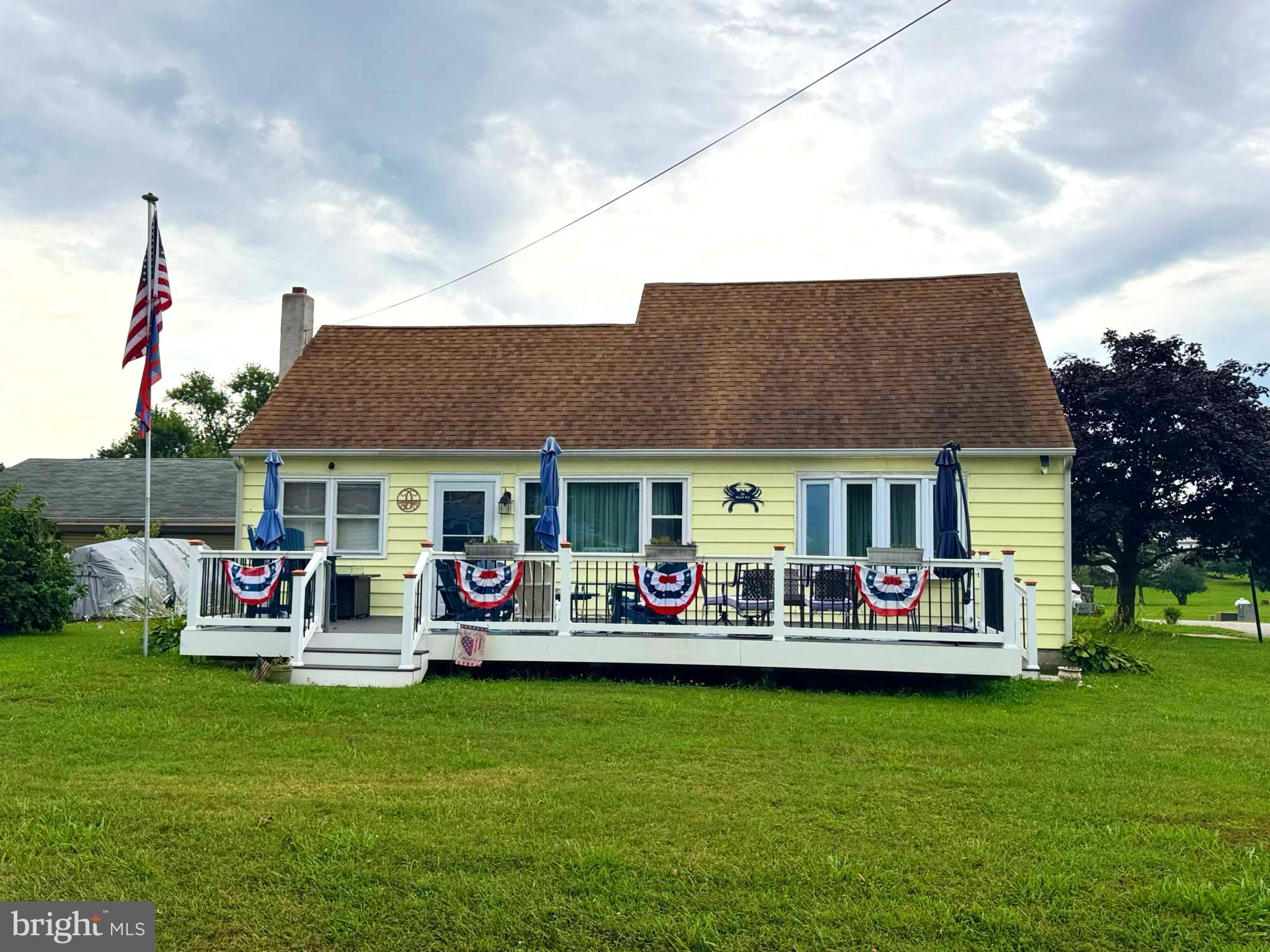 Amazing 2 bedroom, (plus additional loft area) and 2 full bath home in the community of West View Shores! Situated on a corner lot with a large detached garage, this beach cottage is currently set up to sleep 10+ people!! This home has been remodeled to include stainless appliances and granite countertops in the kitchen, new paint, new bar in the back porch area. 1st floor laundry, updated carpet, LPV flooring, tile flooring, updated fixtures, the list goes on and on! This is a move in ready gem! The community offers a private beach and boat ramp! It is the perfect beach getaway or live full time in vacation mode! Call Lori today for a private tour!