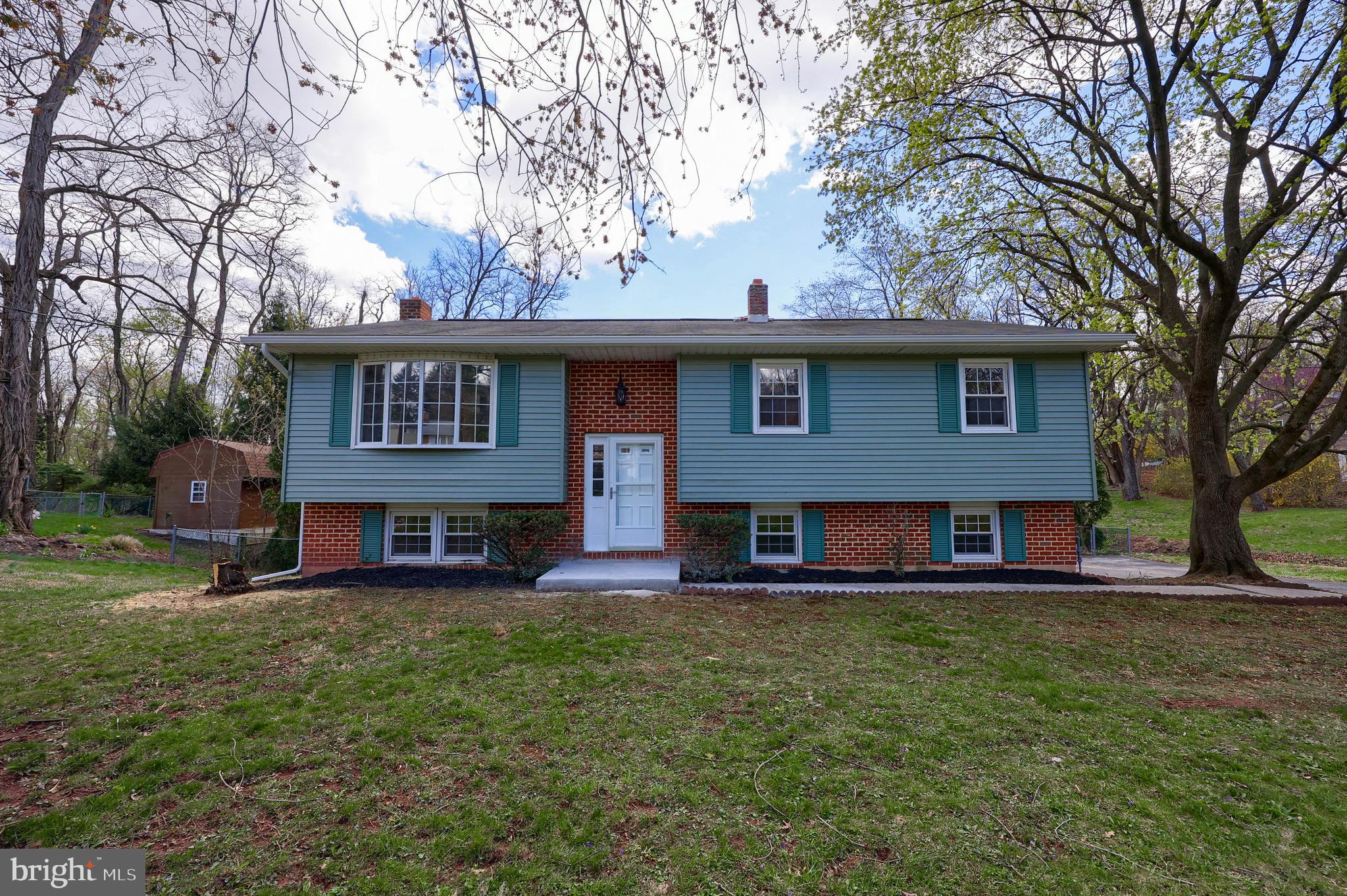 WOW!! Beautifully remodeled, spacious, 3 bedroom, 1.5 bath split-level house with an open-plan living/dining/kitchen space on the main level and a finished basement bonus room. Featuring new HVAC mechanicals, wall-to-wall luxury vinyl flooring, new appliances, and upgraded granite countertops, this house is move-in ready! The property boasts an acre of land with a fenced-in yard, deck, patio, shed with play space, and little bridges to extended backyard spaces. Don't miss out on your chance to make this house your home! Schedule a showing today!