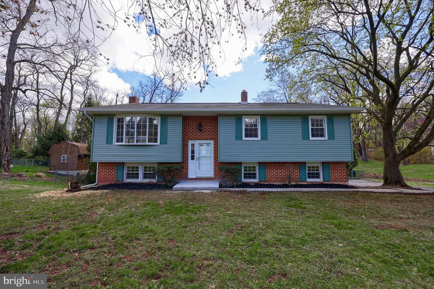 WOW!! Beautifully remodeled, spacious, 3 bedroom, 1.5 bath split-level house with an open-plan living/dining/kitchen space on the main level and a finished basement bonus room. Featuring new HVAC mechanicals, wall-to-wall luxury vinyl flooring, new appliances, and upgraded granite countertops, this house is move-in ready! The property boasts an acre of land with a fenced-in yard, deck, patio, shed with play space, and little bridges to extended backyard spaces.  Don't miss out on your chance to make this house your home! Schedule a showing today!