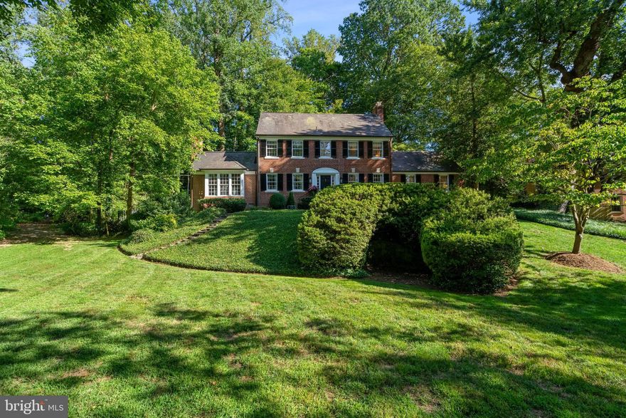 Classic and prominent Spring Valley center hall colonial in one of the neighborhood's most desirable locations. Perched upon a hill adjacent to the entrance of Spring Valley Park, 3601 Fordham Road exudes curb appeal, privacy and sophistication. The sweeping level front lawn and generous hardscape create an inviting entry to this stunningly designed home. Once inside, the discerning buyer will find a generous main level with 3 fireplaces spread across a traditional formal living and dining room, expanded family room with  three directions of sun filled windows and vaulted ceilings, an adjacent gourmet kitchen featuring updated countertops, an eat in breakfast area and French door access to a secluded and private rear garden/entertaining space ideal for alfresco dining.  An oversized study/1st floor bedroom with en-suite bath  offer yet another entertaining room or flexibility for additional guest accommodations. The 2nd floor has three full bedrooms (one which is currently being used as a walk in closet) including an owners bedroom that has its own ensuite bath and spans the entire width of the home. Two additional and surprisingly large bedrooms and a shared bath in the dormer eaves of the house provide even more guest space. The lower level provides ample storage, laundry facilities and direct access to the attached two car garage. A truly stunning offering that embodies the best of Spring Valley.