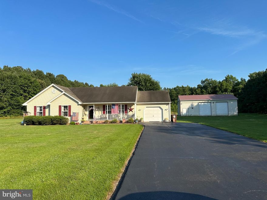 This well-maintained, one owner home offers single story living on 2.89 acres in the countryside of Delmar! Outside you'll find a large fenced in yard, an attached one car garage, and a 48x30 pole building with a walk-in door and two garage bays. This would make a perfect starter home or forever home!