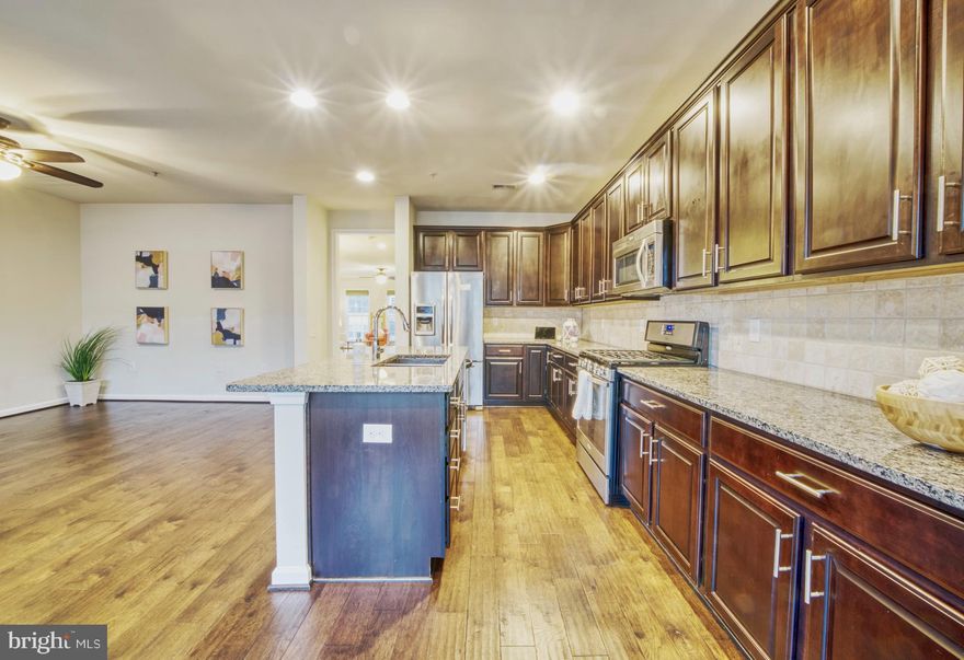 Saratoga model, top two floors. Spacious with 2600 sq ft with hardwood on the main living area. Open layout with plenty of natural sunlight! 3 bedrooms, 2.5 baths, garage with driveway, and plenty of parking. An open den for your home office/computer area on the upper lvl. Modern granite counter tops, stainless steel appliances, and gorgeous custom cabinets. Close to day care, shopping and restaurants. Commuter bus station located across Sycolin. UPGRADES: New A/C onditioner in April, 2021 with permit, 6 new smoke detectors+Carbon Monoxide in Oct, 2021, new Disposer in May, 2021, new toilet in the master bathroom in July, 2020, new wood crown molding around all upstairs in Jan, 2019, new Faucet in the kitchen sink in Jan, 2019, two new shower heads in the upstairs bathroom and the  master bathroom in Feb, 2019, & three new Round Closed-Front toilet covers in three bathrooms.