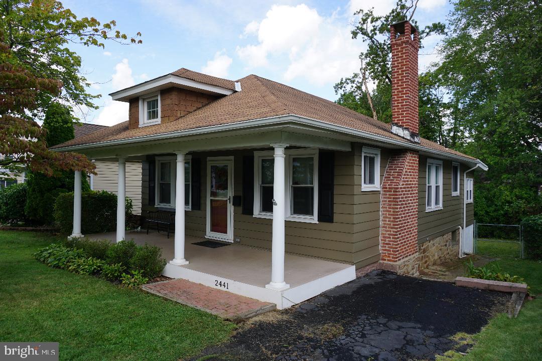 Completely renovated home. Possible 3 Bedroom. Updated kitchen with Granite counter tops and newer appliances. New Hall Bathroom. Large heated sunroom that could be possible 3rd bedroom. Covered front porch. Large finished basement that a portion of it could be a possible bedroom and family room. Fenced rear yard. Off Street Parking. Gas Forced air heat and Central Air. All new Vinyl windows. Fireplace. Stairs to attic. Won't last long. Showings start Saturday September 13