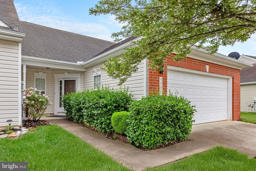Welcome to easy, one-level living in Delmar’s sought-after Wood Creek Golf Community! This charming home features an open floor plan designed for both everyday comfort and entertaining. The kitchen is equipped with ample cabinetry, a double sink, built-in microwave, and a convenient pantry, plus a breakfast bar ideal for casual meals. Enjoy larger gatherings in the adjacent dining area, which flows seamlessly into a spacious living room with a bright bump-out and glass sliding doors leading to a private patio—perfect for dining al fresco or relaxing outdoors.

The primary bedroom offers a peaceful retreat with an ensuite bath featuring a dual sink vanity. A second bedroom is located at the front of the home, ideal for guests or a home office. With maintenance-free lawn care included, you’ll have more time to enjoy all that this vibrant community has to offer.

Wood Creek amenities include a clubhouse with fitness room, an inground pool, scenic walking trails, and a golf course just steps from your door. Located minutes from local parks, shopping, dining, and seasonal events, and just a short drive to the beaches of Fenwick Island and Ocean City, this home offers the perfect blend of comfort, convenience, and coastal lifestyle.