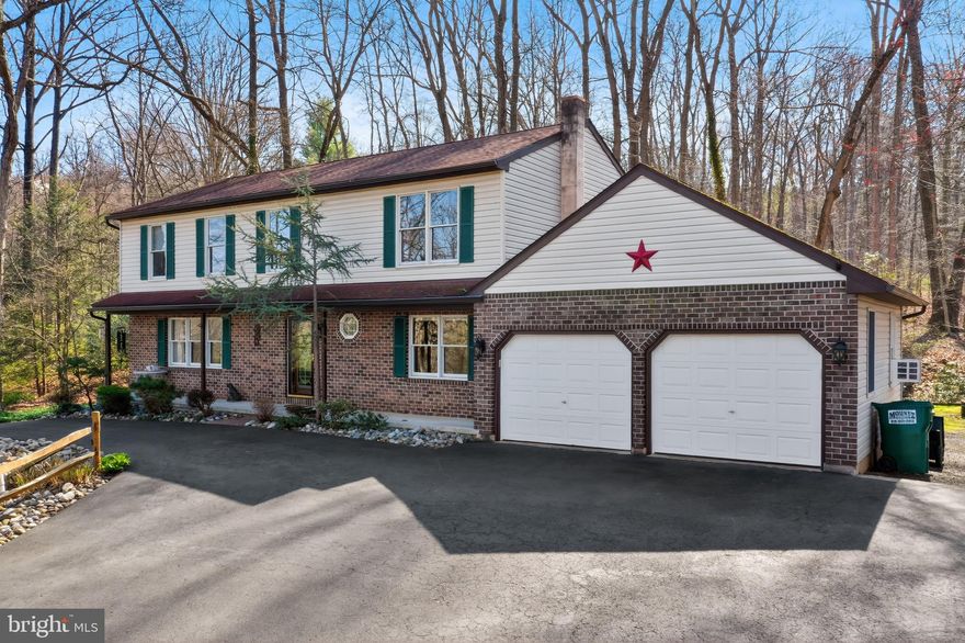 Welcome home to 2343 Hay Creek Road, located in the highly desirable Twin Valley School District. Nestled on 1.4 private, wooded acres, this property offers the feel of your own peaceful mountain retreat.
This spacious home features 4 bedrooms and 2.5 bathrooms—ideal for those looking to grow. 
 The main level includes a formal living room and dining room, a bright kitchen with a cozy breakfast nook, a convenient powder room, and a wonderful family room filled with natural light and scenic views.
Upstairs, you’ll find four generously sized bedrooms along with two full bathrooms, providing plenty of space for everyone.
Step outside to enjoy a beautiful deck surrounded by lush landscaping, flowers, and mature shrubs—perfect for relaxing or entertaining.
Additional highlights include a wrap-around driveway, a 2-car garage, and a full basement, offering plenty of storage space. The seller is also offering a 1-year home warranty for added peace of mind.
Don’t miss your chance to own this serene and inviting home—schedule your showing today before it’s gone!