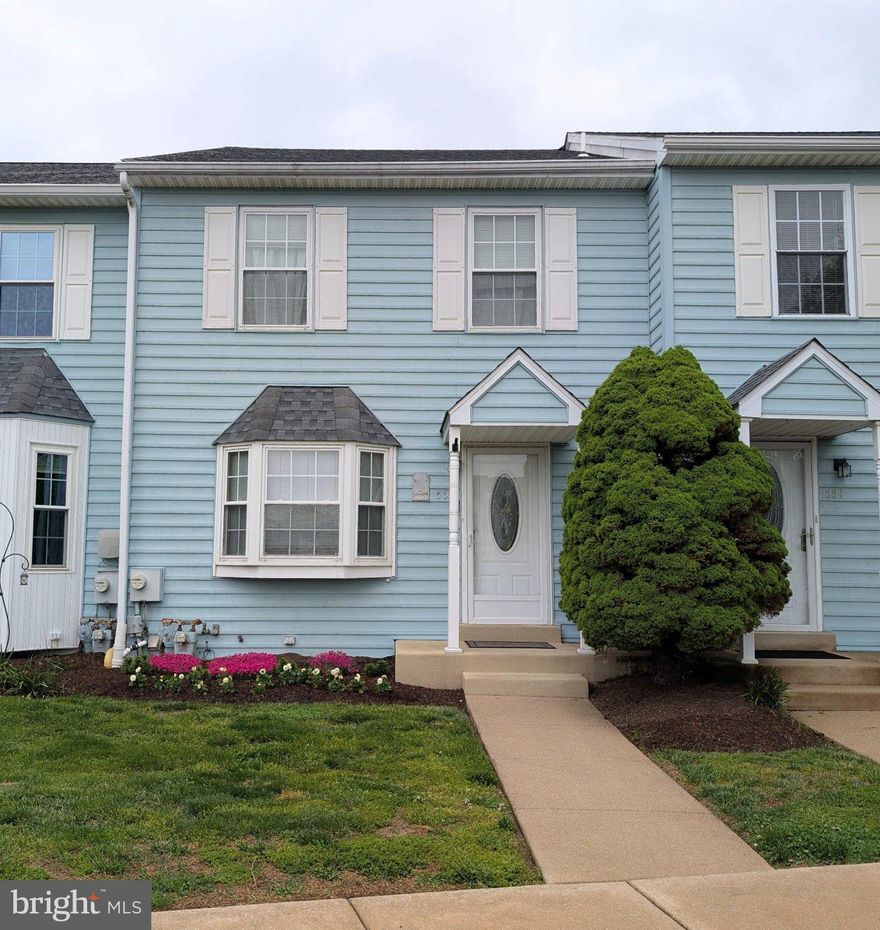 Nestled in the charming neighborhood of Cherry Tree Knoll, this exquisite Colonial townhouse offers a perfect blend of elegance and comfort. With 1,440 square feet of thoughtfully designed living space, this home had been recently painted and well maintained. Step inside to discover a warm and inviting atmosphere, where natural light dances through the spacious rooms with LVP flooring. The open-concept layout seamlessly connects the living and dining areas, creating an ideal space for entertaining. The updated kitchen is spacious and functional, featuring white cabinets, ample counter space and modern appliances (Microwave, refrigerator  and oven 1 year old and newer sink). Whether you're crafting a gourmet dinner or enjoying a casual breakfast, this kitchen is designed to inspire your culinary creativity. Retreat to the serene primary suite complete with an en-suite bathroom. The second bedroom offers versatility, perfect for guests, a nursery or a home office. The second level also has a hall bathroom, linen closet and new pull down metal stairs to the partially floored attic, Every inch of this home is utilized to its fullest potential. Step outside onto the expansive deck (one of the largest in the development) with a dedicated gas line. This outdoor space is perfect for summer barbecues, savor your morning coffee or unwind with a glass of wine as the sun sets. The full daylight basement provides additional living space, ideal for a family room, media room, gym, or play area, allowing you to customize this home to fit your lifestyle. The lower level has an electric fireplace, laundry room , storage closet with built in tool storage, a cedar closet, utility room and French doors to a patio and storage shed. With assigned parking and a low-maintenance exterior, you can spend more time enjoying the finer things in life and less time on upkeep. Conveniently located near major highways, local amenities, parks, and dining options. The association takes care of common area maintenance, lawn care, snow removal, and trash services, allowing you to enjoy a carefree lifestyle. This property is not just a house; it's a place to call home. Experience the perfect balance of luxury and warmth in this stunning Colonial townhouse-your dream home awaits.