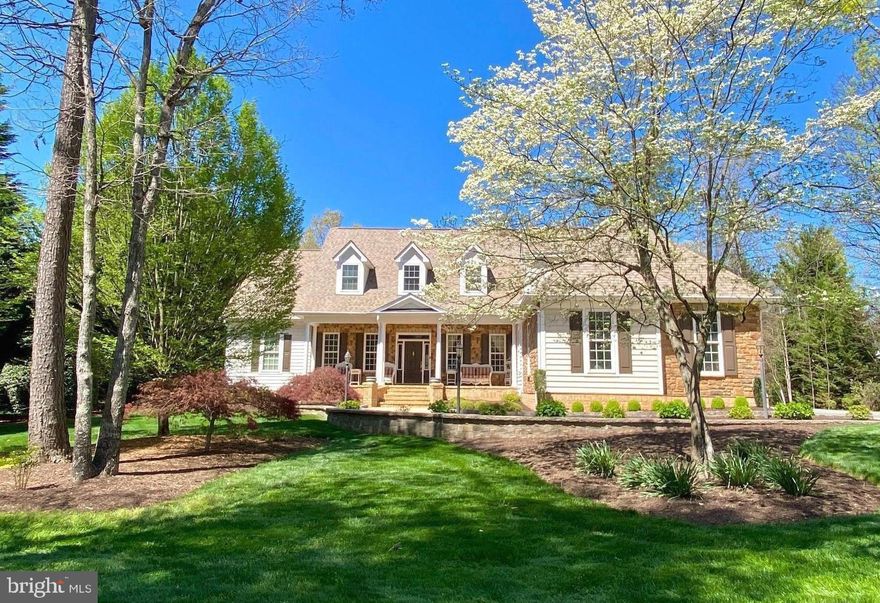 Amazing Offering of this charming home inside the luxurious, amenity filled community of Fawn Lake. Located overlooking a spectacular community pond, this impressive Dream Home is striking with it's perfect presence on Park-like Grounds.  A wide, brick-trimmed Front Porch welcomes you to the beautiful Hall entry with tray ceiling and gleaming Brazilian cherry floors.  On one side of the Foyer is a Living Room/Office with French doors and on the other is an elegant Dining Room offering a tray ceiling and Butlers Pantry.  Ten foot ceilings carry to the expansive Great Room with distinctive coffered ceiling and gas fireplace framed by deep custom wood cabinetry.   The huge chef's Kitchen boasts painted cherrywood cabinets, a large center island with area for seating, twin stainless commercial refrigerator and freezer, newer gas range, quartz counters and a farmhouse sink.  Enhancing this lovely home is the addition of an incredible 3-Season room with handsome vaulted wood ceiling on the rear of the property showcasing unobstructed pond views.  At day's end, relax in the  Primary Suite with inviting sitting area, lit tray ceiling and walk-in closet.  The fabulous Bath with bronze fixtures features handsome cabinetry, silestone quartz counters, a soaking tub and oversized shower.  Finishing the Main Level is an incredible Laundry/Craft room with custom cabinetry, a "drop zone" area and desk.  An open staircase leads to the Upper Level featuring two Bedrooms with a shared Bath, a Bedroom/Bonus room and hall Bath for added options.  Finished in 2017, the Lower Level includes a Recreation Room with Wet Bar, Office/Exercise Room, Bedroom (NTC) and full Bath.  Bountiful mature landscaping, that irrigates from the pond, permits easy, outdoor entertaining options.  An extension from a two to four car Garage allows incredible extra space for vehicles, golf carts, etc.  New(er) roof, HVAC units, two sump pumps and a built-in Generator provide peace of mind. The beautiful gated Fawn Lake Community offers an array of incredible amenities, including a recreational lake, beach, Arnold Palmer-designated golf course, tennis courts, baseball and soccer fields, a dog park, volleyball courts, walking trails, a Community Clubhouse, marina, fitness center, restaurants, Country Club, playgrounds, and much more! Situated in the picturesque countryside near the town of Fredericksburg, this community is surrounded by parklands and is only a few miles away from farmers' markets, wineries, and award-winning breweries.  Schedule your showing today to experience the luxurious lifestyle only Fawn Lake can offer!