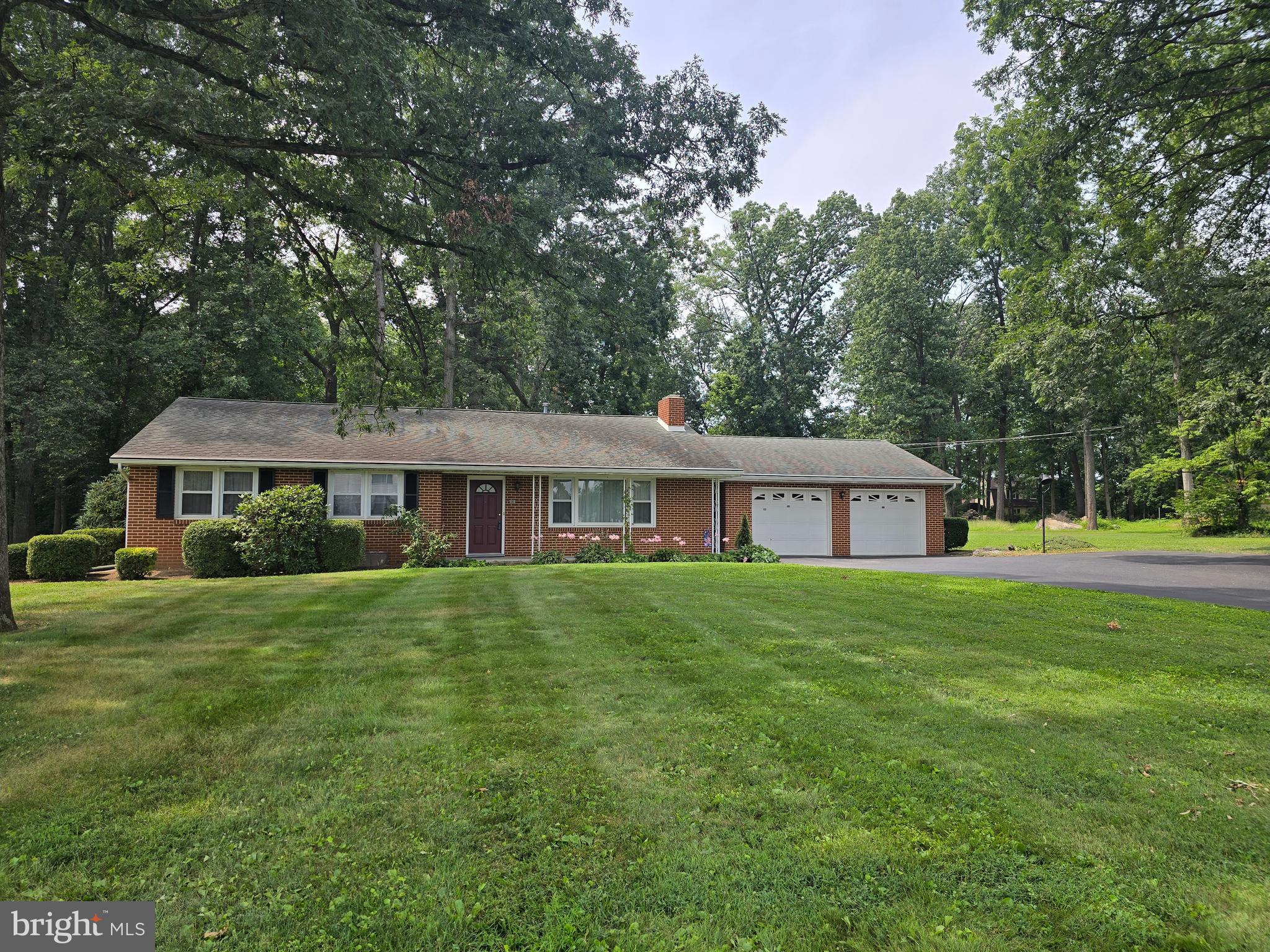 Here is your opportunity to own this sprawling Ranch Style brick home on 1.59 acres ; just a minute from town, easy travel access, grocery shopping, hospital/Doctors; located in South Middleton Township, Private Septic, Public Water, Natural Gas Heat and Central Air. Attached oversized 2 Car Garage and a Detached oversized 2 + car garage/Workshop with attached Storage Shed. Plenty of room for everything and a large level private backyard. Such a peaceful setting! Paved driveway includes extra parking spaces for those large gatherings. 3 bedrooms and 2 baths, full basement waiting for your personal touch. Separate Laundry Room with storage.