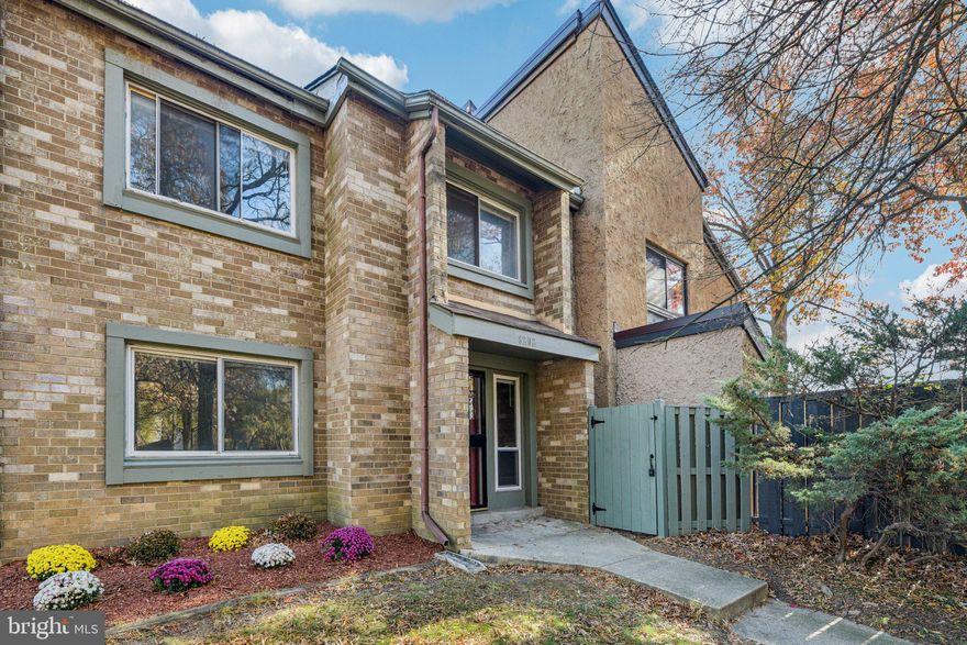 Welcome home to this brick end-unit townhome tucked into the established Glen Ora community of Greenbelt. Set on a quiet, tree-lined terrace, this two-level residence offers a comfortable 3-bedroom, 1.5-bath layout with generous living spaces, assigned parking, and access to sought-after neighborhood amenities. An inviting front entry opens into a spacious main level with a large living and dining area that easily accommodates everyday living and entertaining. The adjoining kitchen sits conveniently at the heart of the home, offering ample cabinet storage, practical counter space, and room to organize your favorite cooking tools, with an easy flow back toward the dining area for serving guests. A main-level powder room and multiple storage closets add to the functionality of the first floor.



Upstairs, all three bedrooms are grouped together on the second level, creating a separate, quiet retreat from the main living spaces. The well-proportioned bedrooms offer flexible options for a home office, guest room, or hobby space, along with a full hall bath and additional storage. With no basement to worry about, day-to-day living is streamlined across two finished levels, and the layout makes it easy to maintain the home and keep everything within reach.



Outdoor living is a key part of the appeal. Just beyond the main level you’ll find an outdoor space at the rear of the home that’s ideal for setting up a grill, a small patio dining set, or container garden, extending your living and entertaining area when the weather is nice. Around the community, mature trees, sidewalks, and well-kept common areas create a pleasant neighborhood feel and encourage daily walks or a quick stroll to the nearby amenities.



Residents of Glen Ora enjoy a strong amenity package at a very reasonable HOA fee, including use of the outdoor community pool, tennis courts, tot lots/playgrounds, and common-area lawn care, trash, and snow removal—giving you more time to enjoy your home and less time on exterior upkeep. Commuters will appreciate the convenient Greenbelt location with quick access to the Beltway, I-95, and the BW Parkway, as well as nearby Metro and bus options, putting major employment centers within easy reach, including NASA Goddard and the University of Maryland. Shopping, dining, fitness and recreation opportunities are all close by, including the Greenbelt Aquatic & Fitness Center, local parks, and neighborhood retail and services.



If you’re looking for an end-unit townhome with a sensible two-level layout, community outdoor pool access, and a convenient Greenbelt address, 8202 Canning Terrace is a must-see.