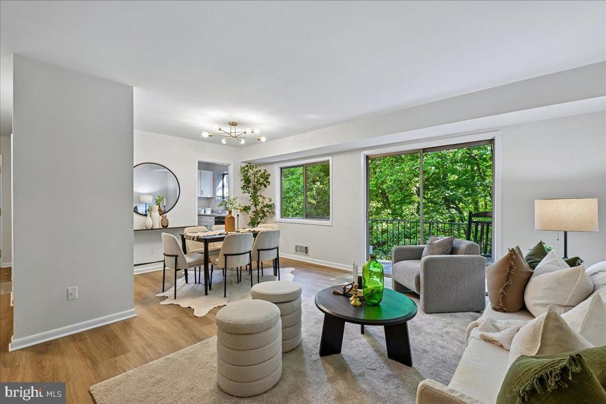 One of the best units in Parkside!!  First floor entry, but the balcony is 2 levels up!  Private balcony overlooking woods.  Parking is only steps from the front door!  From this location in Parkside you have quick access to Garrett Park and the MARC train, but then you can easily bike/drive closer to the Strathmore Metro station and park in one of the condo parking areas to access the Metro.  New kitchen, new floors, fresh paint.  The photos say it all.  Includes storage unit in lower level for bikes, decorations, etc.