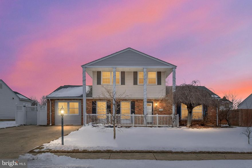 If you have been searching for an updated 4-bedroom, 2.5-bath home with a spacious fenced rear yard, your opportunity has arrived. An inviting covered front porch leads to the open concept main living level featuring newer LVP flooring, a freshly painted neutral color palette, and a modern lighting package that creates a bright, cohesive feel throughout.
The living room showcases crown molding and a custom feature niche wall with an electric landscape fireplace that adds warmth and ambiance. The adjacent dining area is enhanced with chair railing and crown molding and offers a sliding door to the expanded covered composite deck overlooking the fenced rear lawn, creating an ideal setting for everyday living and outdoor gatherings.
The kitchen features stainless steel appliances, including a new dishwasher and range installed in 2026, along with granite countertops accented by a decorative backsplash. On the opposite side of the foyer, a comfortable family room and refreshed primary bedroom suite provide convenient main-level living. The primary suite includes a shiplap feature wall, walk-in closet, and a full bath with a ceramic tile walk-in shower.
A standout feature of the home is the incredible sunroom, complete with recessed lighting, crown molding, and a built-in low console table. A custom stacked stone bar with a waterfall quartz countertop, wet sink and two beverage refrigerators makes this space perfect for entertaining.  A separate entrances that allow gatherings to easily extend outdoors. A renovated powder room and laundry room complete the main level.
Upstairs, you will find three additional spacious bedrooms and a full bath that provide flexibility for family, guests, or work-from-home needs. The updated water heater adds peace of mind. With its proximity to major commuter routes and Wilmington Airport, this home is ideally positioned to simplify your daily commute while keeping you close to shopping, dining, and regional travel.

Note:  Select interior photos have been virtually staged.