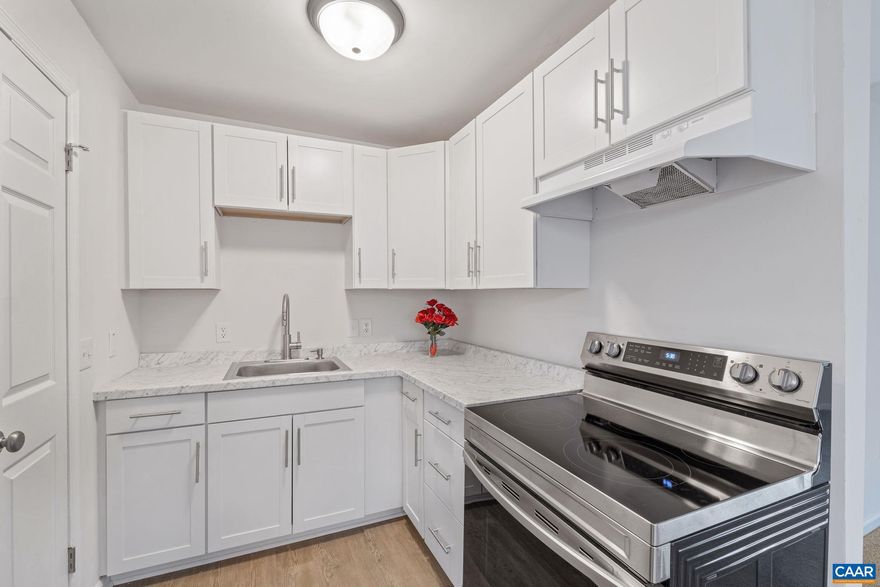 Sit out on your deck and enjoy the sounds of nature and the relaxing stream meandering by this remodeled home featuring single level living, a bright eat in kitchen with new cabinets, countertops, upgraded stainless appliances and pantry. New flooring and paint throughout main level. The freshly painted basement can be used as additional living space or for future expansion or storage. NEW roof, NEW HVAC, NEW Gutters. Tucked into the woods surrounded by nature enjoy the convenience of living outside the gated area while enjoying all the amenities Lake Monticello has to offer. Move in ready and priced to sell.,Solid Surface Counter,White Cabinets,Fireplace in Basement