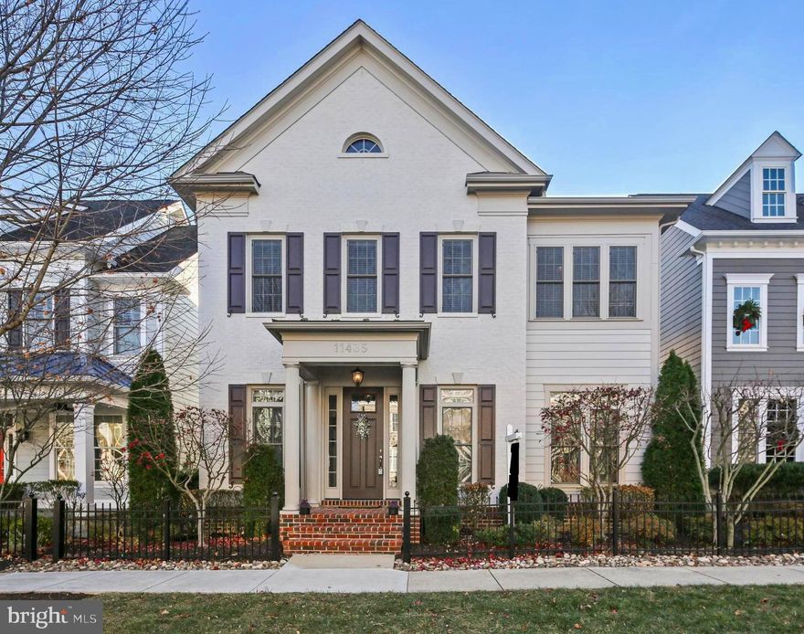 Like new Mitchell and Best single family home with first floor owner's suite. With over 5000 square feet of finished living space, this pristine home shows true pride of ownership. Gleaming hardwood floors adorn the main level's open layout. Fabulous upgraded chef's kitchen overlooks the generous sized great room with stone surround fireplace, both with coffered ceiling. The combination living and dining room are ideal for entertaining, allowing for a generous size table for large gatherings. The main level owner's suite is a rare find for the Maple Lawn community, two walk-in closets and upgraded bath with quartz countertop vanity and custom tile shower. The laundry and mudroom lead to the builder's upgraded garage with epoxy flooring. The upper level of the home features a well-appointed layout with two large bedrooms and a full bath in the front of the home plus an en-suite with a beautiful full bath facing the rear of the home and an oversized loft with hardwood flooring and recessed lighting for fun and entertaining. Need more space? The lower level offers a recreation room, a gym with rubber mat flooring, a full bath, large bedroom with oversized custom closet and professionally finished storage area. Enjoy all the amenities Maple Lawn has to offer as well as shopping and dining just down the street. It's easy to see why the Maple Lawn community is the most highly sought after community in Howard County!