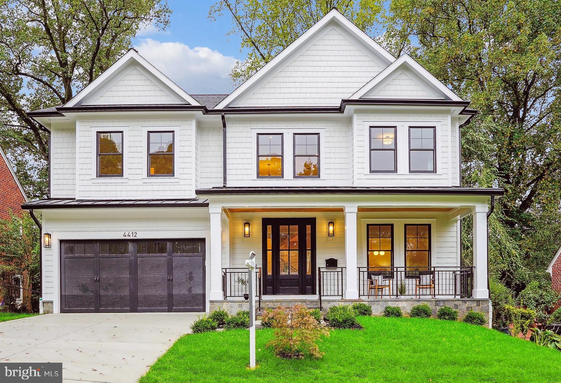 Welcome to 4412 Westbrook Lane—a gorgeous modern farmhouse in the heart of Kensington. This newly constructed home on a quiet street is a masterpiece of contemporary design, seamlessly blending elegance with functionality.
With approximately 5,000 square feet of thoughtfully curated living space across three levels, this home invites you to indulge in comfort and style. The stunning white oak floors grace the main and upper levels, beautifully complemented by large Andersen windows that bathe each room in natural light and custom light fixtures that add a touch of sophistication.
As you step inside, the covered front porch warmly welcomes you into a formal living room, an elegant dining room, and a sprawling gourmet kitchen with a large island that opens to the family room—perfect for entertaining and for family gatherings. You will also love having a private home office on this level! A spacious mudroom, complete with cubbies and built-ins, seamlessly links the garage to the heart of the home, ensuring both style and practicality.
Walking to the upper level, you will be greeted by the spacious loft, that could be used as a second family room, a playroom, homework, project space - the possibilities are endless! You will enjoy your luxurious primary suite, featuring tray ceilings, expansive windows offering picturesque treetop views, 2 huge walk-in closets, and a spa-like bathroom. Revel in the indulgence of a walk-in shower with dual showerheads, dual sinks, and a freestanding tub.
This level also offers three additional generous bedrooms, two full baths, and practical laundry room, ensuring that every family member enjoys their own space. The lower level offers even more living space with a versatile great room, a stylish wet bar for entertaining, a game area, a yoga/exercise room, and a welcoming guest suite, featuring a beautiful full bath.
Step outside to discover a delightful covered flagstone porch that overlooks a fully fenced-in, private backyard —perfect for outdoor gatherings, playtime, or quiet moments.
Conveniently located just outside the Beltway, this home provides easy access to major commuter routes while being within walking distance to KP Elementary School, just down the street from the picturesque Rock Creek Park, and Kensington's charming downtown filled with delightful shops and restaurants. With Bethesda and Washington, D.C., just a short drive away, this residence is the perfect fusion of luxury, comfort, and modern convenience.