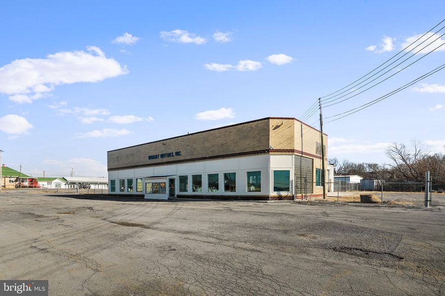 Total of 2.21 Acres of corner commercial almost take up an entire block just mintues from I-81.  Proprety features secure rear fencing, "impound" style lot, 13000 sq ft building, showroom, waiting area and more.  Upstairs is unfinished, but provides space to grow into offices, etc.  MASSIVE shop area features 8 large doors tall enough for tractor trailers and multiple lift locations.  Property could be mixed use with multiple users as needed or create a cooperative of like minded car enthusiasts to make this building a dream come true.  Two other properties beside this listing, 258 Eagle School Rd and 268 Eagle School Rd are also available  and on the market to could create an entire block at 3.04 acres.   Other properties are owned by a separate entity and include an existing bar and auto repair facility.