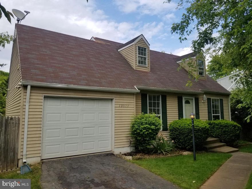 Ready to move in! Gorgeous 3-level, 3-bedroom, 1-car garage home with a huge fenced backyard. You will love all the space this homes has to offer. Large mainlevel with living room, dinning room, a large kitchen and a main level bedroom. Two large bedrooms upstairs with walk-in closets. The finished basement has large rec room, tons of storage, and comes with a washer/dryer. Located minutes from 95, commuter lots, and Potomac Mills; you re close to everything and anything. Huge main level with living room, dining room, and kitchen.  This one can't be beat.