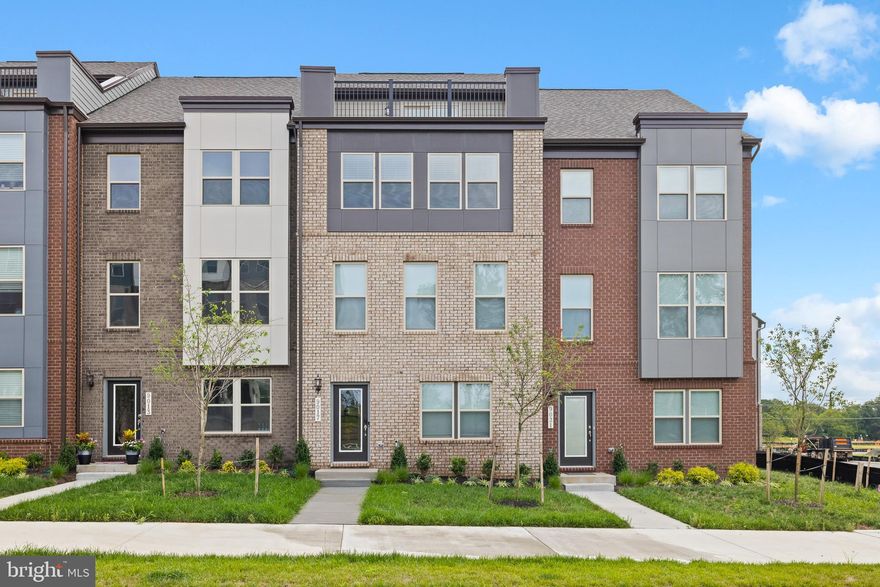Discover Innovation Town Center by Stanley Martin—a community designed to inspire, connect, and elevate your lifestyle. From stylish interiors to unmatched convenience, this home offers everything you’ve been looking for. Brick Front 4 Bed and 4bath Townhome -Step into a sunlit open-concept main level where expansive windows and thoughtful design create a space that’s equal parts cozy and sophisticated. The chef-inspired kitchen, complete with upscale finishes, a generous island, and abundant storage, anchors the home—perfect for entertaining or quiet evenings in. Slide open the doors to an oversized deck just off the dining area—ideal for your morning coffee, alfresco dinners, or unwinding under the stars.
The primary suite is your sanctuary, featuring a spa-style en suite bath and a spacious walk-in closet designed to indulge and recharge. Two additional bedrooms and a full bath provide comfortable, versatile space for family, guests, or your dream home office.
Innovation Town Center combines residential, office, and commercial offerings in one vibrant community. Just outside your doorstep, you'll find:
Resort-style pool & welcoming clubhouse
Nature trails, scenic playground & cozy fire pit
Pickleball courts & rotating local food trucks
All designed to enhance everyday living with a sense of connection and ease.
The Center of It All
Live minutes from George Mason University’s Science & Technology Campus, Downtown Manassas, VRE commuter rail, Jiffy Lube Live, and 2 Silos Brewing Company. With entertainment and essentials at your fingertips, convenience has never looked this good.
Brink front, 4 beds layouts, 2 full baths, 2 half, rooftop terrace, 4th floor Loft with Full Width Front Terrace, Gourmet Kitchen, Alternative kitchen with Island, kitchen Tile backsplash, Flush mount LED light disk, additional Windows,  2 Car Garage with remote, 2 Powder rooms, Deck, Oak Stairs at Foyer, Primary Bathroom tiled mudset shower pan
Big community feature includes: Tennis courts, Kids play areas, lots of open space for walk
Smart door lock, smart thermostat