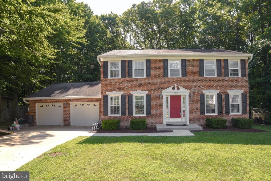8600 Valley Drive was listed for sale on 7/13/2023. However, some websites may include days when the home was temporarily off the market in their count of days on the market. It's important to remember this when considering the length of time the property has been listed.  Intensely Captivating and Thoughtfully Updated Two-Story Home in Waldorf! Perfectly positioned on a cul-de-sac lot in a quiet and friendly community, this 4BR/2.5BA, 2,128sqft property scintillates the senses with classic colonial architecture, a stately brick façade, a brilliant red front door, and a beautiful backdrop of lush mature trees. Enchanting and lovingly maintained, the interior sensationally charms with gleaming hardwood flooring, attractive wainscoting, thick crown molding, a sophisticated formal dining room, and a large living room for hosting guests. Offering an entertainment-friendly space, the upgraded open-concept kitchen features stainless steel appliances, custom butcher block countertops, solid wood cabinetry, tile flooring, an electric range/oven, dishwasher, French door refrigerator, center island, breakfast nook, and an adjacent family room with a full brick wall wood-burning fireplace. Tranquility reigns supreme in the blissful backyard, with an expansive wood deck, tons of green space, and plenty of room for future customization. Restful relaxation and crisp mornings may be discovered in the oversized primary bedroom with ample closet space and a luxuriously remodeled en suite boasting a dual sink vanity and premium finishes. Other features: 2-car garage, laundry area, renovated full guest bathroom w/chic styling, just 7 miles to Downtown Waldorf, close to Berry Road, MD-228, MD-210, schools, restaurants, and more! Call now to schedule your tour!