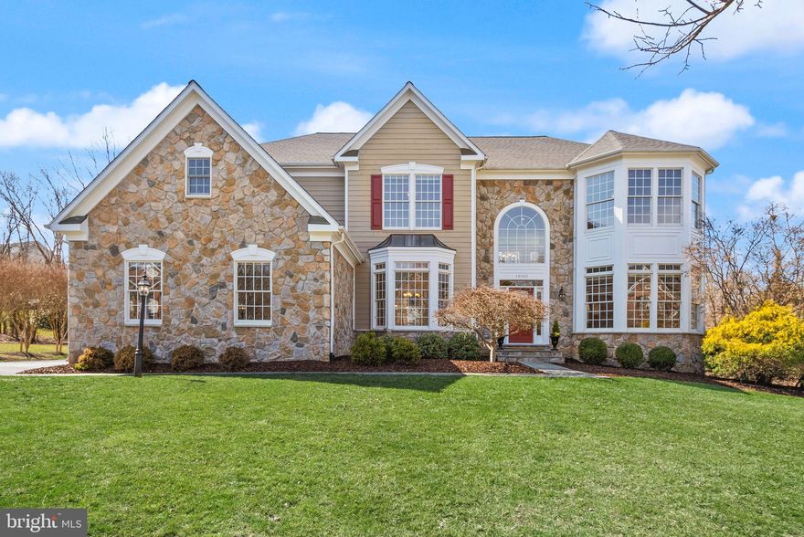 Rare opportunity to purchase an amazing single-owner home, on one of the largest and most unique lots in LOTP! The home sits on a cul-de-sac, backing to woods, with loads of features and improvements. Elevation includes stone and Hardie Plank exterior with two-story bay window and turret. The sought-after side-load, 3-car garage leads into the back staircase, keeping room, and kitchen with walk-in pantry and breakfast area. The front entry opens into a gorgeous two-story foyer, curved staircase, office/library to your right, formal dining room with bay window to your left, and a large powder room. Move straight ahead and you're rewarded with a beautiful family/great room featuring another soaring, two-story ceiling complete with stone-to-ceiling gas fireplace and hearth. Classic arches grace the various room entryways with 10’ ceilings on main level. The kitchen is a chef's dream, with all GE Profile slate appliances (convection double wall-oven and cooktop/downdraft installed 2024), built-in microwave and an oversized Corian island, which provides a salad sink/washing station and 2nd disposal, along with tons of room for eating and entertaining. Walk out of the breakfast room to a gorgeous screened-in porch and deck where you can enjoy your morning coffee while listening to the birds and it is perfect for entertaining your guests. All new flooring throughout main level (refinished/installed hardwood) adds class and beauty under your feet. As you venture upstairs, newly refinished hardwood with new carpet-treads (with refinished handrails & balusters) leads to four large bedrooms and three full bathrooms with new LVP flooring and 9’ ceilings throughout. On one end there is a large bedroom with its own full bath, then a huge master suite with sitting area, tray ceiling, walk-in closet and luxurious bathroom with his-and-hers vanities. Continuing down the hall you will find the laundry room with Whirlpool washer & dryer, and a pair of large secondary bedrooms sharing a Jack-and-Jill full bath. Walk down the rear staircase and bank right downstairs to the lower level on newly carpeted stairs. There you will find the 5th bedroom (optionally an office, den or playroom) with new LPV and a full bathroom. Great for guests, maybe even long-term ones! The rest of the basement is a blank palette for you to design, with massive open space and a rough-in for yet another bath or bar, and a walk-up, double-wide stair to the expansive idyllic rear yard. A small herd of deer may greet you and there is a seasonal creek among the trees along the property line. Mature trees and landscaping complete this lovely setting on more than a half-acre to call your own. REALTORS: Please see the documents section for all the features of and improvements to this home, including: roof replaced 2018, 75-gallon water heater 2019, new appliances 2023 and 2024, HVAC (two-zone) 2011 and 2016, Therma-Tru fiberglass camber-top door, side lights and transom 2021, restored front slate sidewalk 2024, neutral paint 2023 and 2025 and the list goes on! This is a can't miss, fantastic home, and we would be delighted to have you come take a look.  NOTE:  Seller may need rent-back as part of any offer.  ALSO:  There is a one-time $2500 'capital contribution' fee due by the purchaser at settlement.