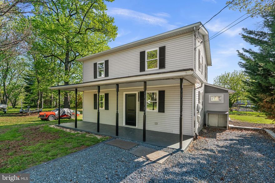 Welcome to 2636 Haddaway Road, where everyday living is paired with breathtaking water views in the highly desirable Brannan community and no HOA. This beautifully renovated home with thoughtful updates, including an improved driveway offering additional parking for added convenience. Fully renovated from top to bottom, this home blends modern finishes with the peaceful, coastal charm that makes Edgemere so special. The heart of the home is the brand-new kitchen, ideally positioned to capture stunning water views and provide direct access to the new deck, your front-row seat to morning sunrises, evening breezes, and year-round waterfront serenity. The best part? Enjoy incredible water views without the premium price tag or ongoing waterfront dues. The main level also features a spacious family room, dedicated dining area, and a full bath, perfect for both everyday living and entertaining. Upstairs, you’ll find three generously sized bedrooms, all filled with natural light and complemented by gleaming hardwood floors throughout and an additional full bath.  Step outside to a large, flat yard offering plenty of space to relax, entertain, and take in the views. Whether you’re enjoying a quiet morning coffee or hosting summer gatherings, this outdoor space delivers. Complete with a covered front porch, mature trees, a private setting, and now enhanced parking, this home offers both comfort and functionality in a quiet, friendly neighborhood. All of this, just minutes from major routes, giving you the perfect balance of serene coastal living and everyday convenience.