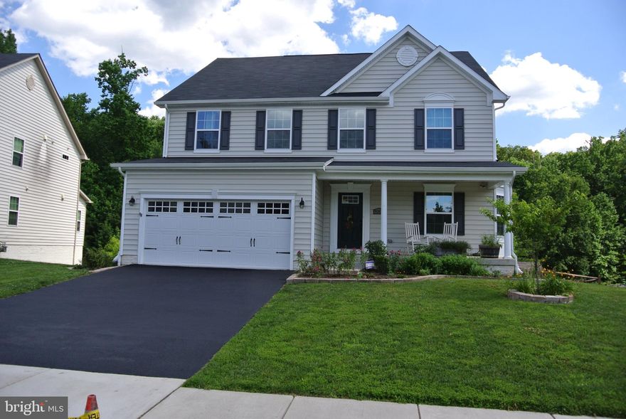 Welcome Home!  This huge colonial backs to woods that are part of the forest retention for the subdivision.  Relax on your deck after a hard day at the office.  Enjoy your morning coffee in the sunroom. Working from home these days?  You will love the first floor office and FIOS high Speed Internet.  Large Family Room for the Kids is just off of the Kitchen or send them downstairs in the Finished Rec Room to play.  Primary Bedroom boasts a huge walk-in closet.  Over 4700 Finished Square Feet to enjoy.  Great commuting location. Close to Schools, Shopping & Commuter Lots.  Move In Ready.  This one wont Last long.