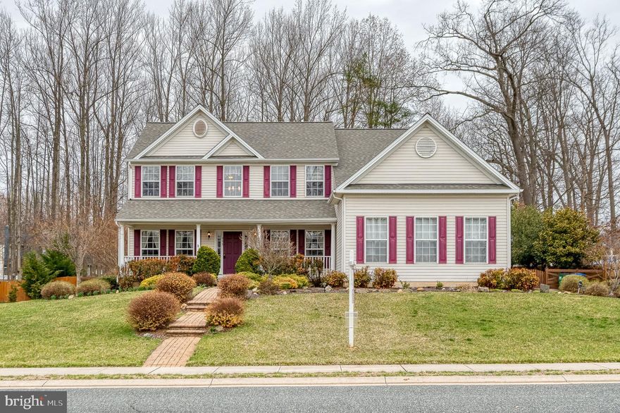 Welcome to 555 Beards Hill Road, a well-maintained home featuring inviting living spaces, abundant natural light, and a functional layout ideal for both everyday living and entertaining. Recent updates include a new roof (2022), hot tub (2023), and dual-zone HVAC (2024). The main level showcases a dramatic two-story family room and foyer, along with a versatile bedroom or office featuring French doors and built-ins. The eat-in kitchen has 42-inch cabinets, granite countertops, and a stylish backsplash, while the living and dining rooms have moldings accenting the space. Upstairs, the primary suite offers a French door entry, cathedral ceiling, walk-in closet, and en-suite bath with double sinks, soaking tub, and separate shower. Three additional spacious bedrooms and a full hall bath complete the upper level. The finished lower level is perfect for entertaining, with surround sound, a wet bar, a large recreation room, a full bathroom, and an additional bonus room currently used as a gym. This home is conveniently located near APG, shopping, dining, and major commuter routes.