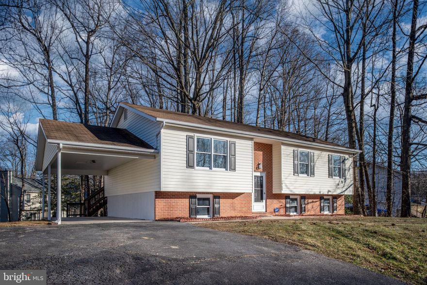 Newly renovated, this stunner on .69 acre parcel offers 4 spacious bedrooms, 3 full baths, and nearly 2000 sq. feet of finished space. Your HGTV dreams of modern farmhouse will come to life with all the custom trim and mill work throughout (including: shiplap wall accents, herringbone wall trim design & more),  all newly installed black matte light fixtures & hardware, sleek countertops and LVP flooring. The fully finished basement boasts a bedroom with a walk-in closet, a home office, a recreation room, and a full bath. Step out onto the large back deck and enjoy the view of the spacious yard – perfect for relaxation and outdoor activities. The over-sized carport provides weather shelter for year round parking or a great space to entertain guests. Don't miss out on the opportunity to make this your dream home!"
