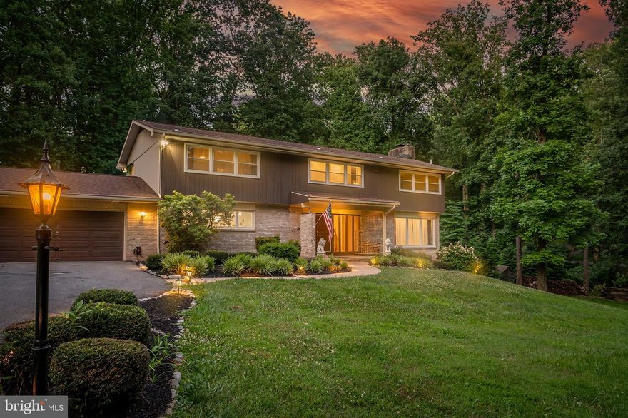 Welcome to 11411 Marbrook Rd, a magnificent retreat nestled on a tranquil corner lot in the prestigious enclave of Caves Valley.

This exquisite residence has been meticulously updated with custom finishes throughout, offering a perfect blend of sophistication and modern elegance. The main level, designed for grand entertaining and intimate gatherings alike, features a bright living room adorned with a charming wood-burning fireplace and rich cherry solid wood floors. The elegant dining room, featuring expansive floor-to-ceiling sliding doors, seamlessly connects the indoor living space to a serene zen deck, where you can unwind while overlooking the lush, verdant woods. A tucked-away study provides the perfect space for working from home in peace and quiet.

The gourmet kitchen is a chef's dream, showcasing custom solid wood beveled cabinets, exotic granite countertops, and top-of-the-line appliances. This culinary haven offers both beauty and functionality, making it the perfect space for preparing exquisite meals and entertaining guests in style.

Ascend to the second floor, where four spacious bedrooms and three lavish bathrooms await. The primary suite is a private sanctuary, featuring a spa-like bathroom that exudes tranquility. Indulge in the smart walk-in rain shower, a luxurious retreat designed for ultimate relaxation. Three additional bedrooms provide comfort and privacy for family and guests alike.

The lower finished level is a blank canvas, ready to be transformed into the ultimate family gathering space. Whether you envision a game room, workout room, or home theater, this expansive area offers endless possibilities. It also includes its own full bathroom and provides convenient walk-out access to the beautifully landscaped yard.

Step outside to discover your private oasis, complete with an in-ground swimming pool and a rejuvenating jacuzzi, perfect for relaxation and leisure. This home is a true masterpiece, inviting you to experience the ultimate in luxury living. As an ultimate bonus, unwind in the 8-person hot tub, adding to the luxurious amenities of this remarkable property.

A major update to the home includes a state-of-the-art geothermal system, ensuring efficient heating and cooling throughout the year while saving on utility costs—a testament to both environmental stewardship and long-term financial savings.

Located minutes from major highways, it effortlessly connects county living with the vibrant energy of the city. Schedule your visit today and envision the lifestyle awaiting you in this exceptional property