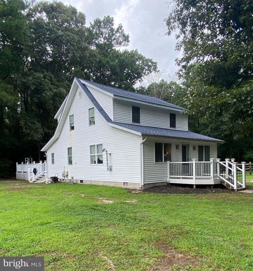 NEW PRICE……Just minutes from everything, yet nestled back in the woods, this remodeled 2 BR, 1 1/2 Bath home on over 3/4 of an acre of land,   with new roof in June 2025, recently added spacious 12 x 24 screen porch,  12 x 30 side deck, recently replaced front deck, outside shower, fenced in side yard,   updated dishwasher and stove,  paver patio area with fire pit, privacy side line fence to the left of the house, and so much more.  Electric was updated in the outbuilding, along with  a finished room build in the outbuilding.  Lots of options for use of that space.  Septic and well were replaced in 2014 by previous owner.   Lots of space to enjoy.  Make your appointment today to view this property.