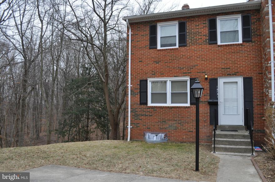 You will love this spacious 3 level, brick end unit town home backing trees.  This home is move-in ready & offers brand new carpet, fresh paint, and new lighting fixtures thru-out.  New tile floors in bathrooms & ample storage.  Updated kitchen with newer counters & walk-in pantry. Stay warm & cozy in front of the fire place. Easy commute, near VRE, I-95, commuter bus, lots, shops, schools, & more