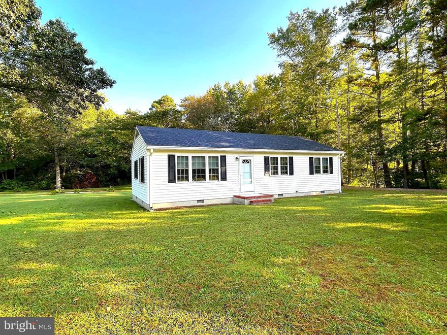 Cozy 3 bedroom, 1 bathroom home with fresh paint, replacement windows, vinyl siding and updated roof situated on a nearly 3/4 acre lot all on a quiet cul-de-sac with no through traffic. The large kitchen has plentiful cabinet space plus room for a table, while the bathroom offers a tiled shower and one of the bedrooms has built-in bookcases. A short drive to Ocean City, downtown Salisbury and just a few minutes from the Salisbury Regional Airport. Septic is working, but is beyond it's functional life, recent inspection recommends replacement. Sold as-is.