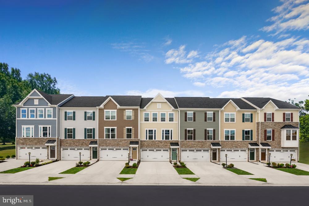 --QUICK MOVE IN-- Mendelssohn at West Park Village, where the convenience of townhome living meets the amenities of a single family home. On the main living level, an enormous kitchen with island opens onto a bright and airy living room, perfect for entertaining. Upstairs are two spacious bedrooms with ample closet space and a hall bath, and a generous Owners Bedroom that features an optional tray ceiling and a huge walk-in closet. A separate Owners Bath features a dual vanity and oversized shower. You'll also love your convenient 2nd floor laundry with room for side-by-side washer and dryer. Several lower level floor plans are available depending on community. Other floor plans and homesites are available. Photos are representative.