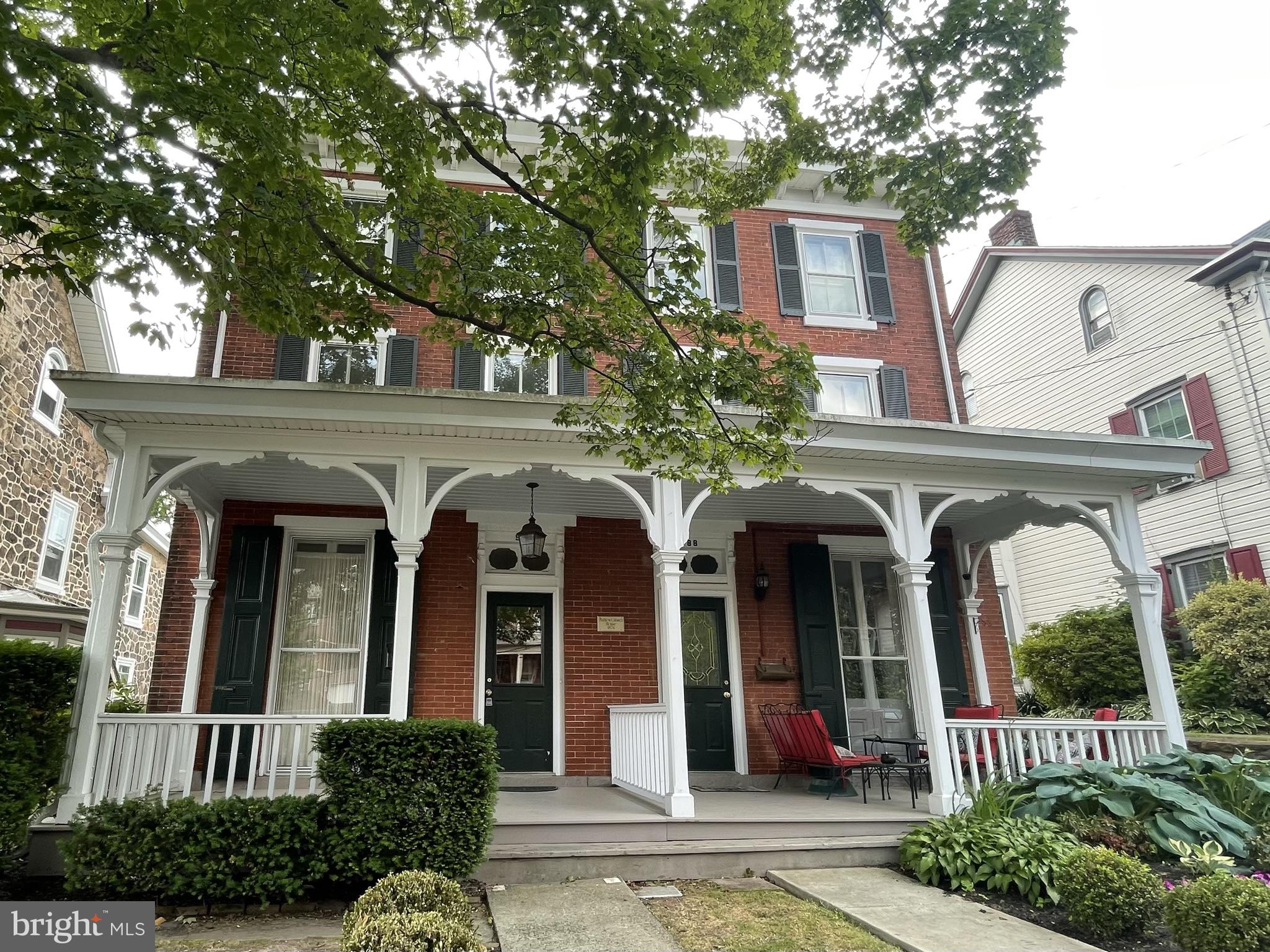 Charming Victorian Twin in the Heart of Doylestown Borough. Welcome to this beautifully updated three story Victorian twin, rich with character and original charm, ideally situated just steps from the best of Doylestown Borough. Enjoy effortless access to local restaurants, boutique shops, public transportation, the library, and cultural museums all within walking distance. The inviting first floor features a sunlit living room, formal dining room, a thoughtfully renovated kitchen, powder room, and convenient main floor laundry. The second level includes a spacious primary bedroom, a versatile sitting room or home office, and a full hall bath. Upstairs, the third floor offers two additional bedrooms and access to a walk-up attic, perfect for extra storage. Freshly painted throughout, this home also showcases gleaming hardwood floors, updated kitchen and baths, and a newer HVAC system for year round comfort. The full unfinished basement offers additional storage. Enjoy quiet mornings on the charming front porch and relaxing evenings on the covered back patio. Additional highlights include off street parking for two vehicles. No smoking. No pets permitted. Don’t miss this rare opportunity to live in one of Doylestown’s most sought after neighborhoods. Schedule your private showing today!
