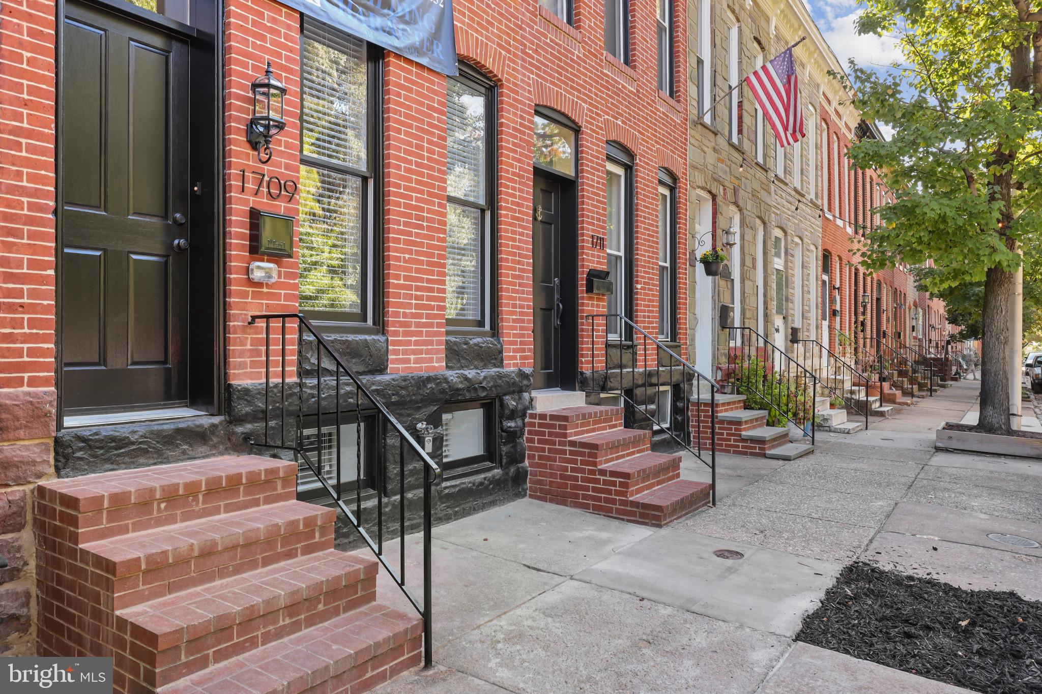 Unbelievable parkfront home in Federal Hill/Riverside with 3 fully finished levels, an easy access 2 car parking pad, a built in audio system for the whole house, and a hallway-accessed rooftop deck with 360 views of the Baltimore skyline. You can be the first person to live in this amazing home since it has been renovated from top to bottom. The main level features brand new hardwood floors, a large living room, a large dining room, and a beautiful brand new kitchen with quartz countertops, stainless steel appliances, and ample cabinet space. The lower level features 2 large bedrooms and a brand new full bath. The upper level features 2 bedrooms, each with their own brand new full bathrooms. Access to the rooftop deck directly from the hallway. This home is directly facing Riverside Park and is steps from all of your favorite local restaurants and bars like Barfly's, Ekiben, Wiley Gunter's, Shotti's Point, and the list goes on. This home is also only a short walk from two shopping centers so you won't have to get in your car to go grocery shopping or to the gym. Pets will love their owners in this pet friendly charmer. Make the best of city living today and kick off the new year in style!