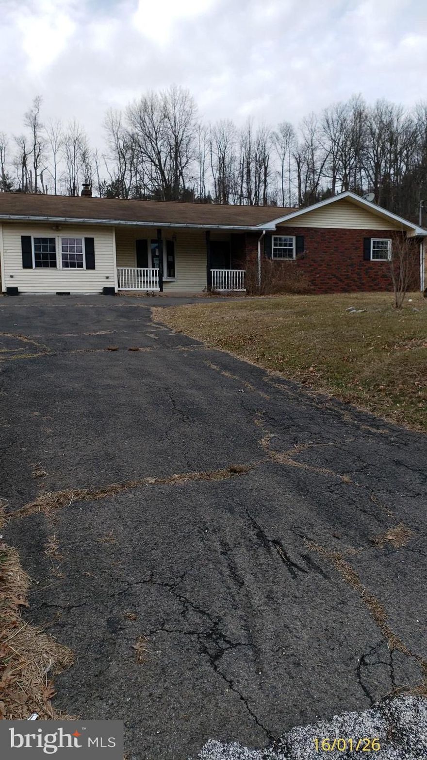 Corporate owned property, being sold as-is condition with no Sellers Disclosure. Purchaser is responsible for the 2% Transfer Tax, All Inspections including Municipal if required, permits and any and all costs associated with them. "Property was built prior to 1978 and Lead Based Paint potentially exists".  This property may qualify for Seller Financing (VENDEE). Single family detached Ranch style home situated in a Rural setting. Offers  2.2 Acres, two car detached garage and is in the Blue Mountain School District. Enclosed Patio in the back to enjoy the Summer Nights. Open eat-in kitchen, Dining room and Living room with fireplace. Three Bedrooms with Hardwood floors and oversized Bathroom.